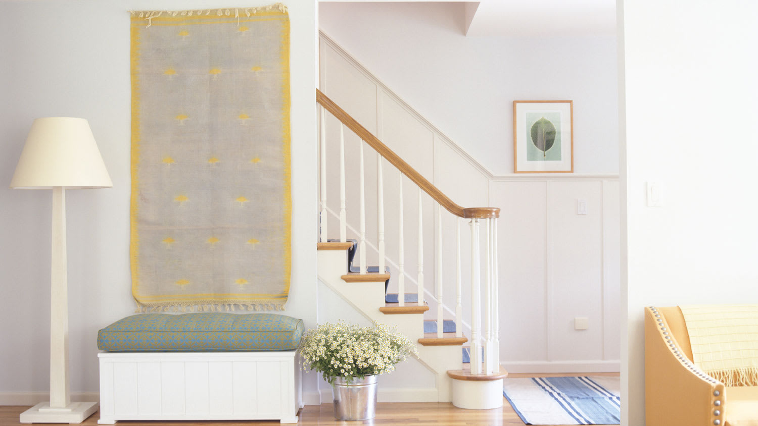 Tapestry hanging on a wall of a house entryway