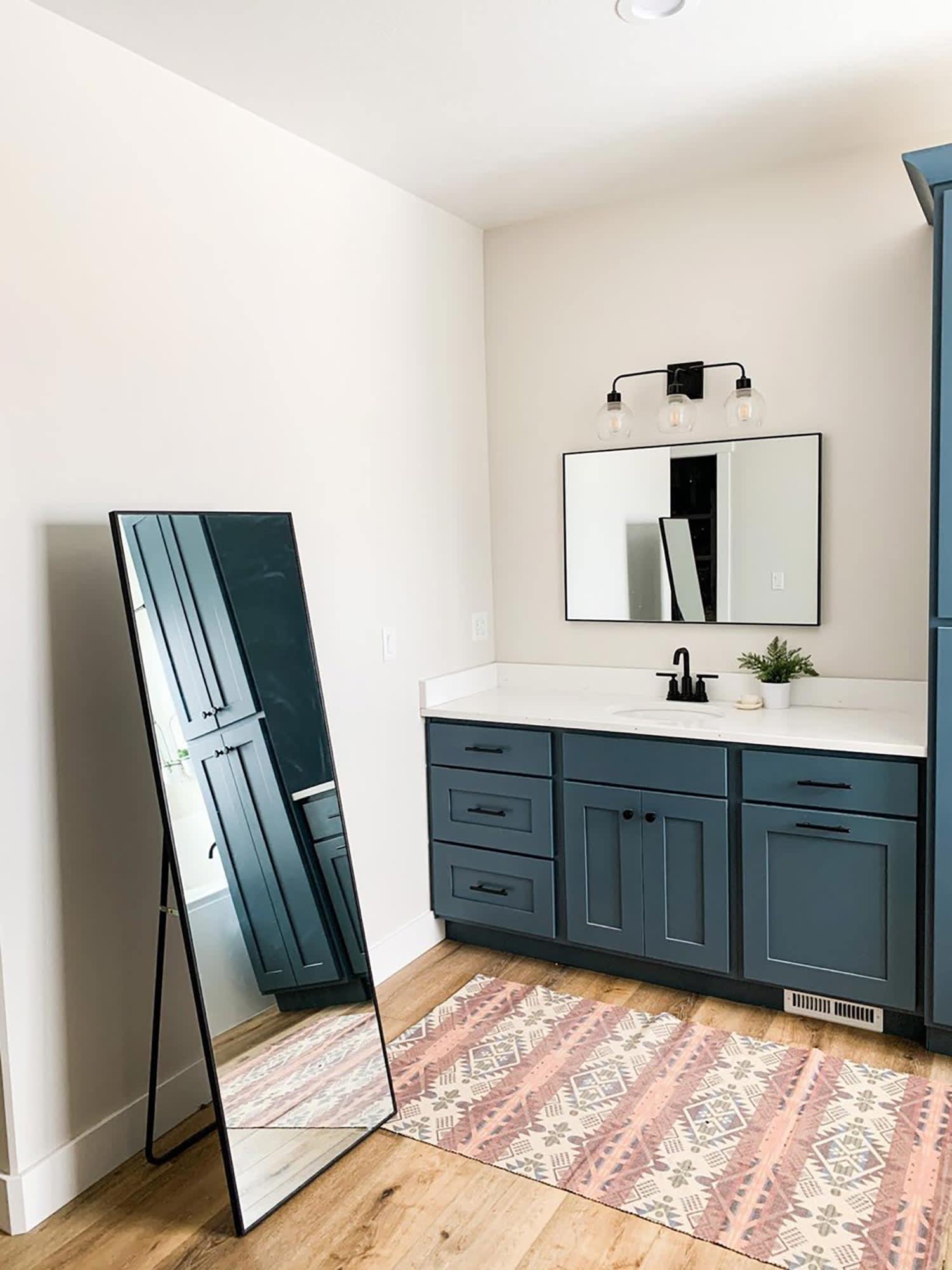 A renovated slate blue vanity