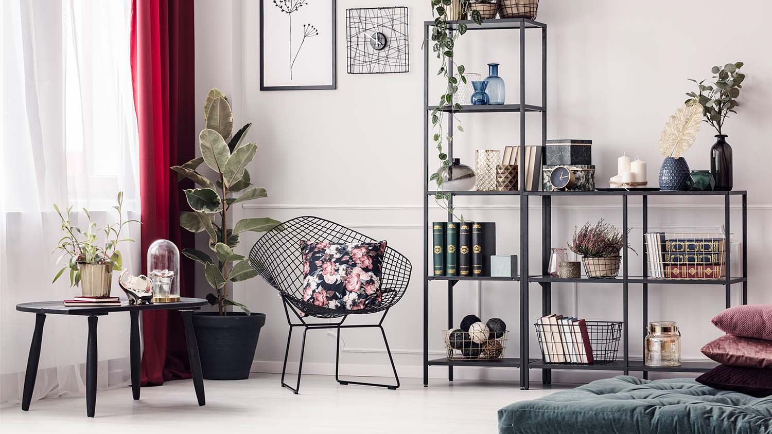 living room with black chair and other black and white furniture