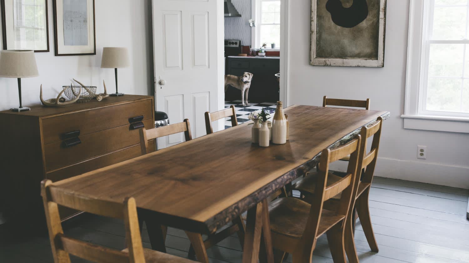 A dining area with farmhouse chairs