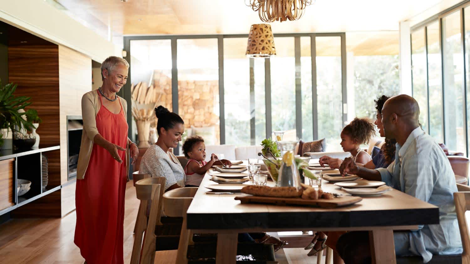 A happy family enjoying lunch at home