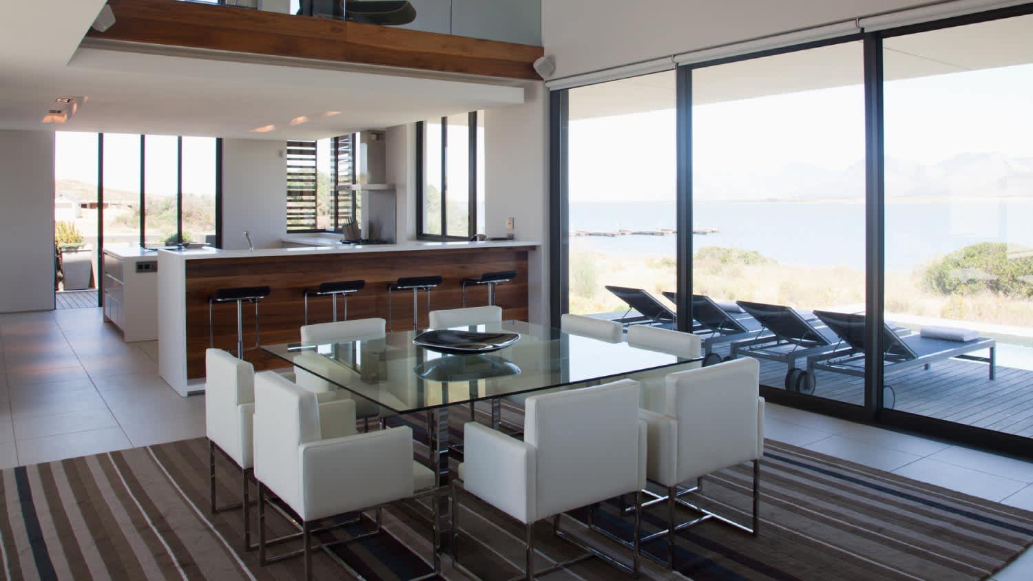 A dining area with sarm chairs