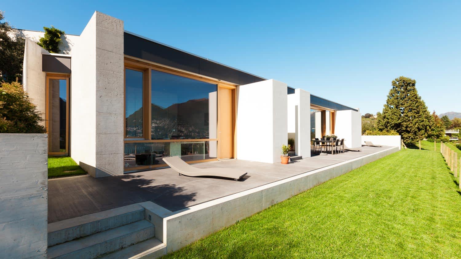 The exterior of a modern house with cement foundation
