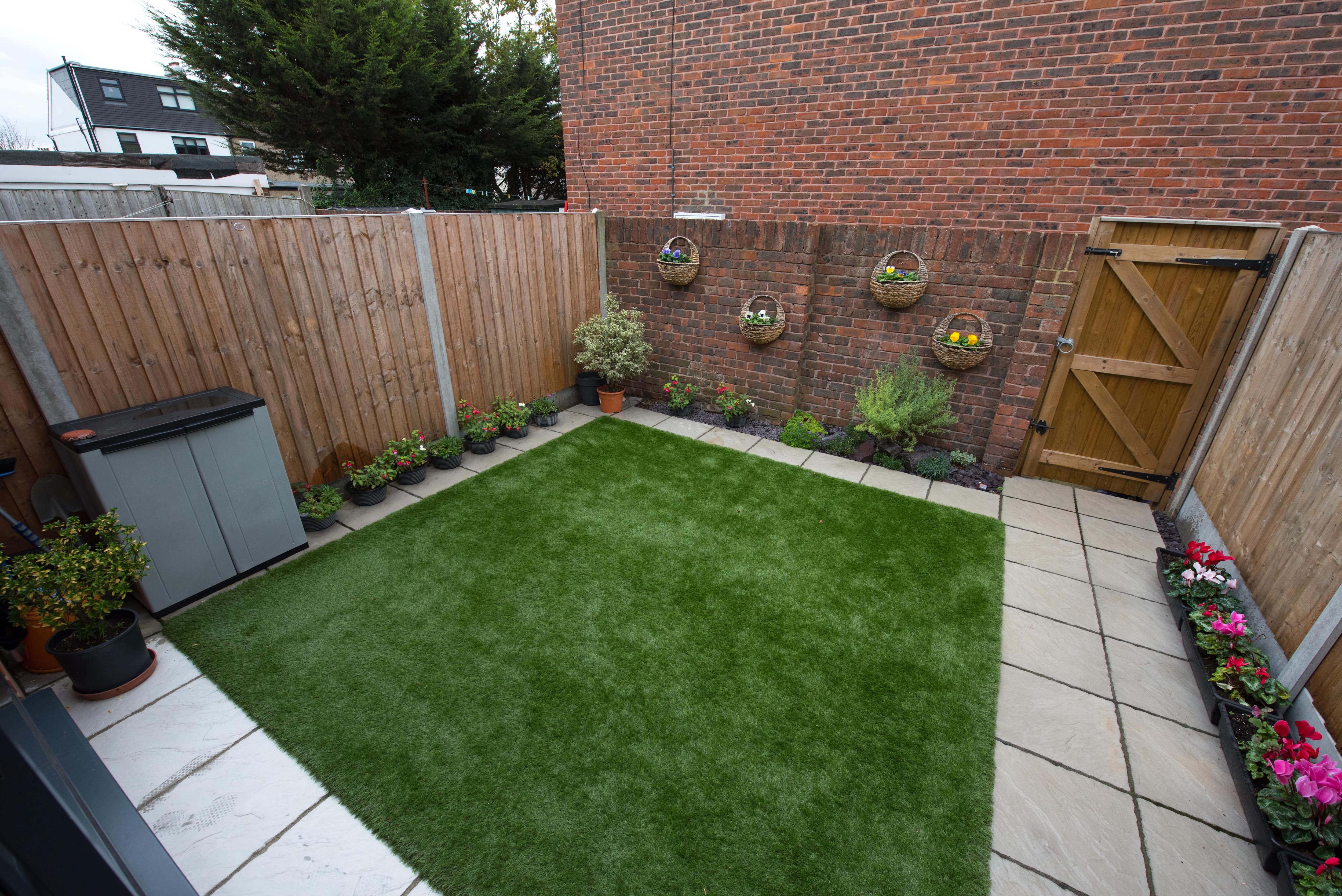 Small backyard with hanging planters