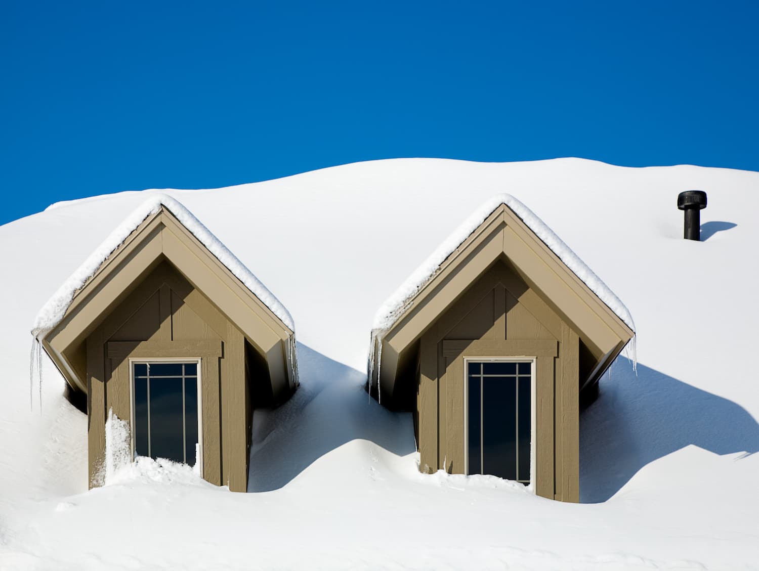 snow covered dormer windows