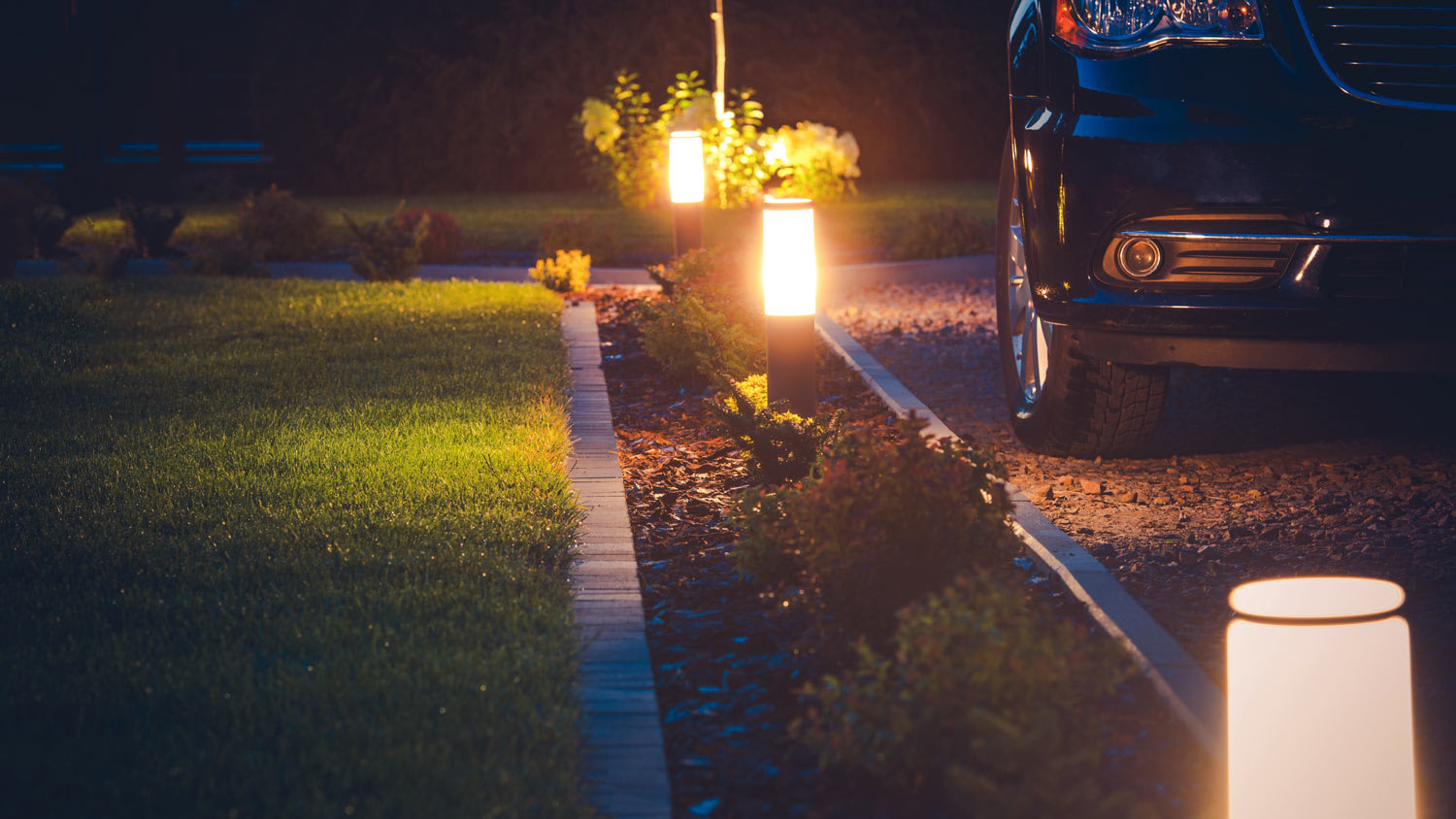 An array of stake lights on a driveway