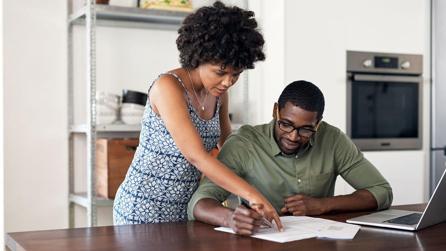 couple going over finances/ contracts