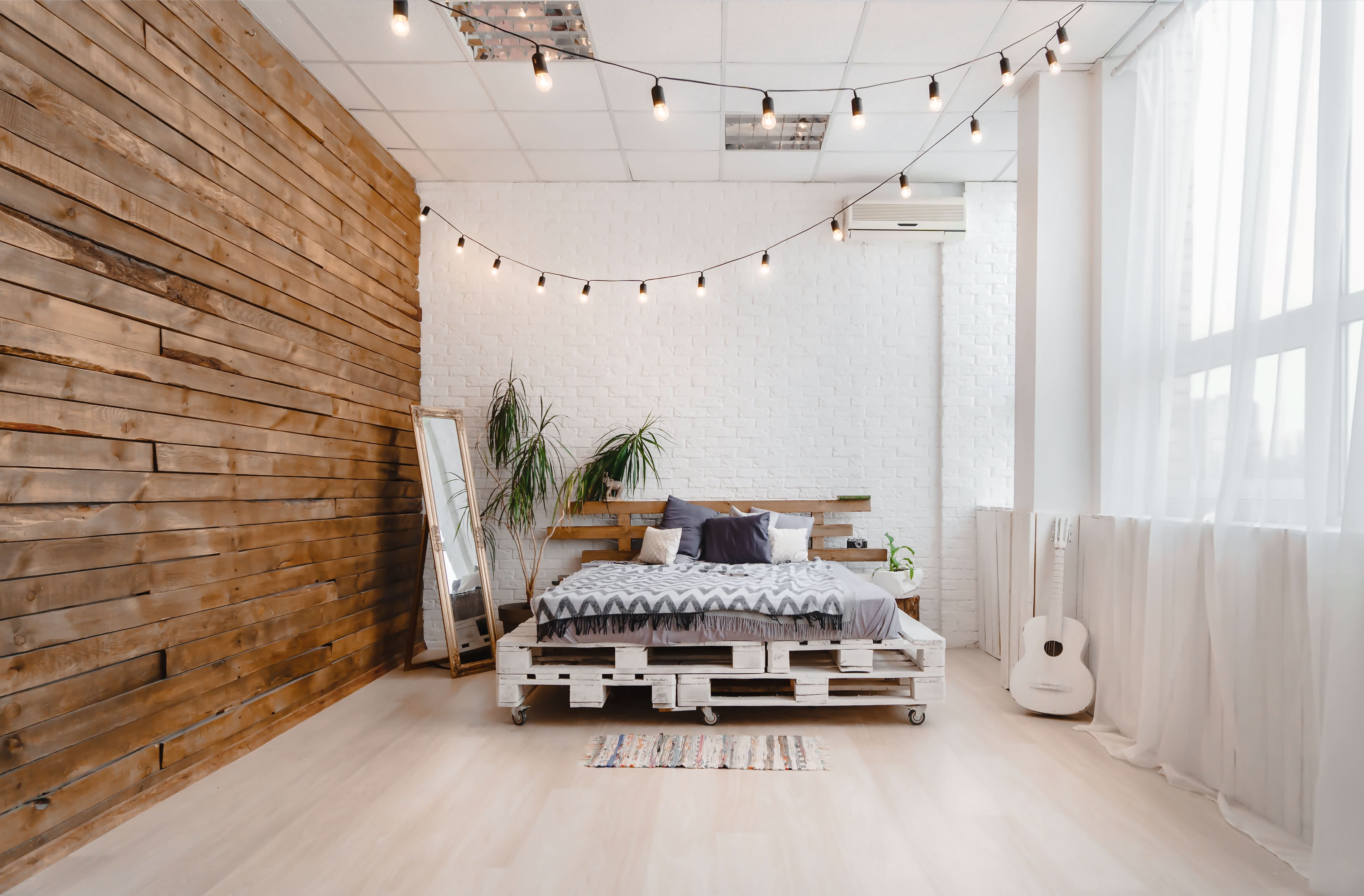 Pallet accent wall in bedroom