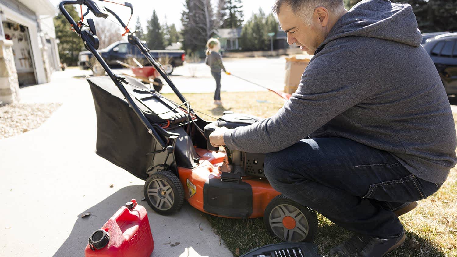 Man lawn mower driveway