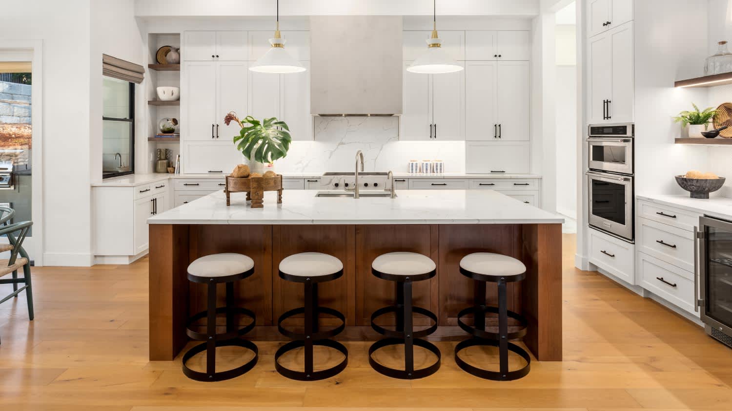 A renovated kitchen with large island