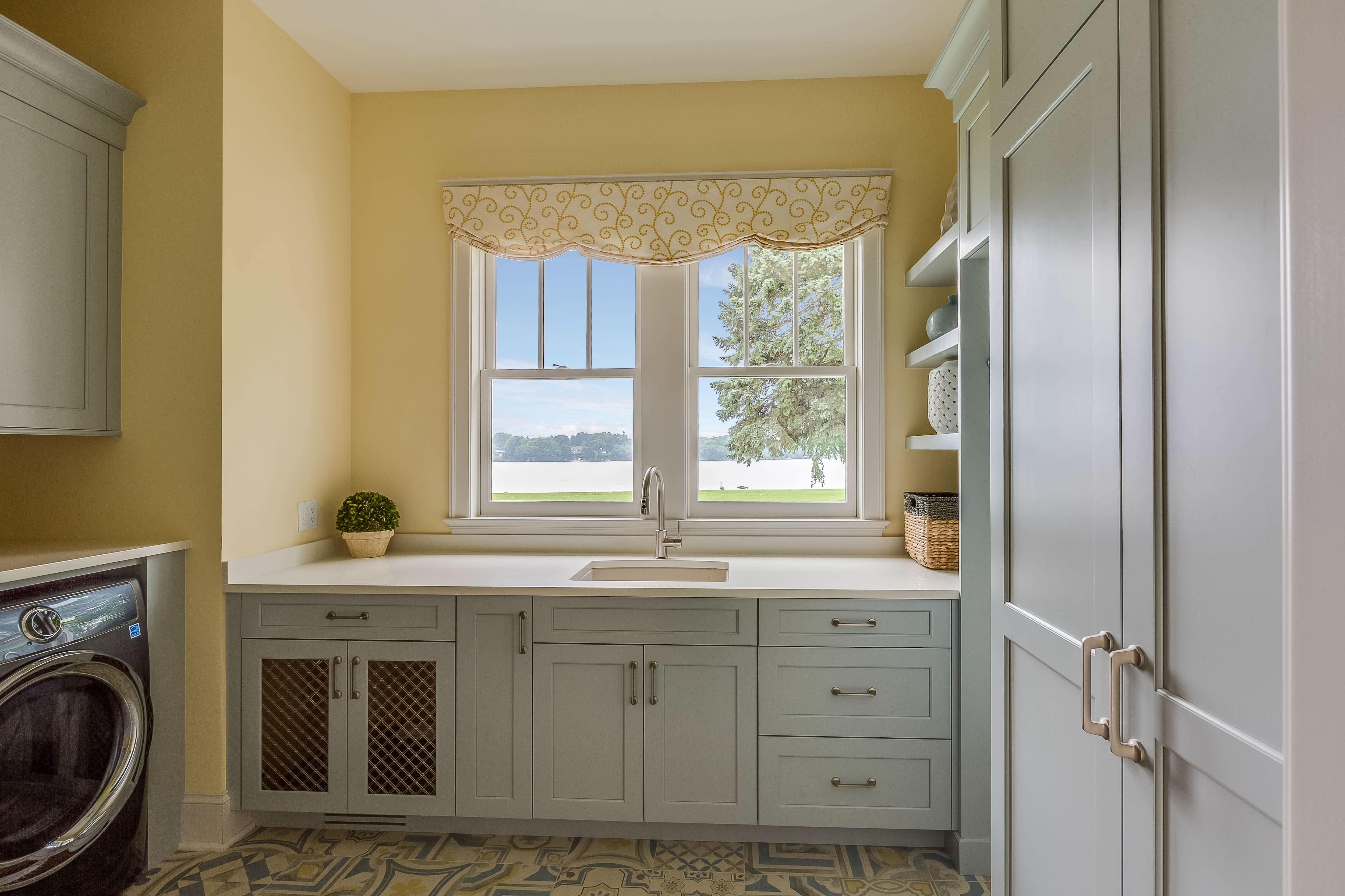 Blue and yellow pastel laundry room