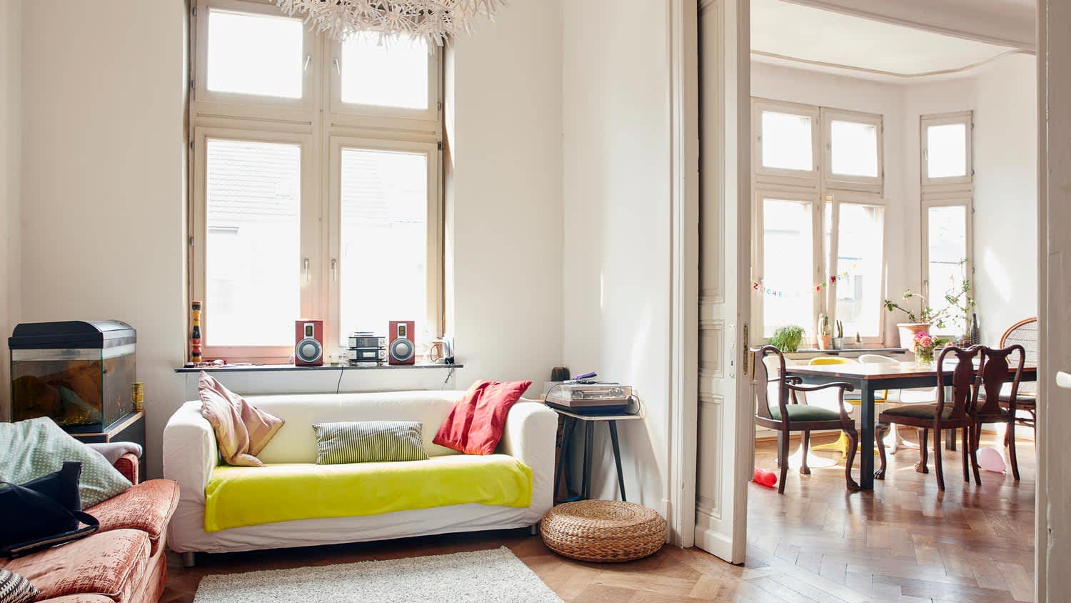A pocket door separating the living room from the dining area
