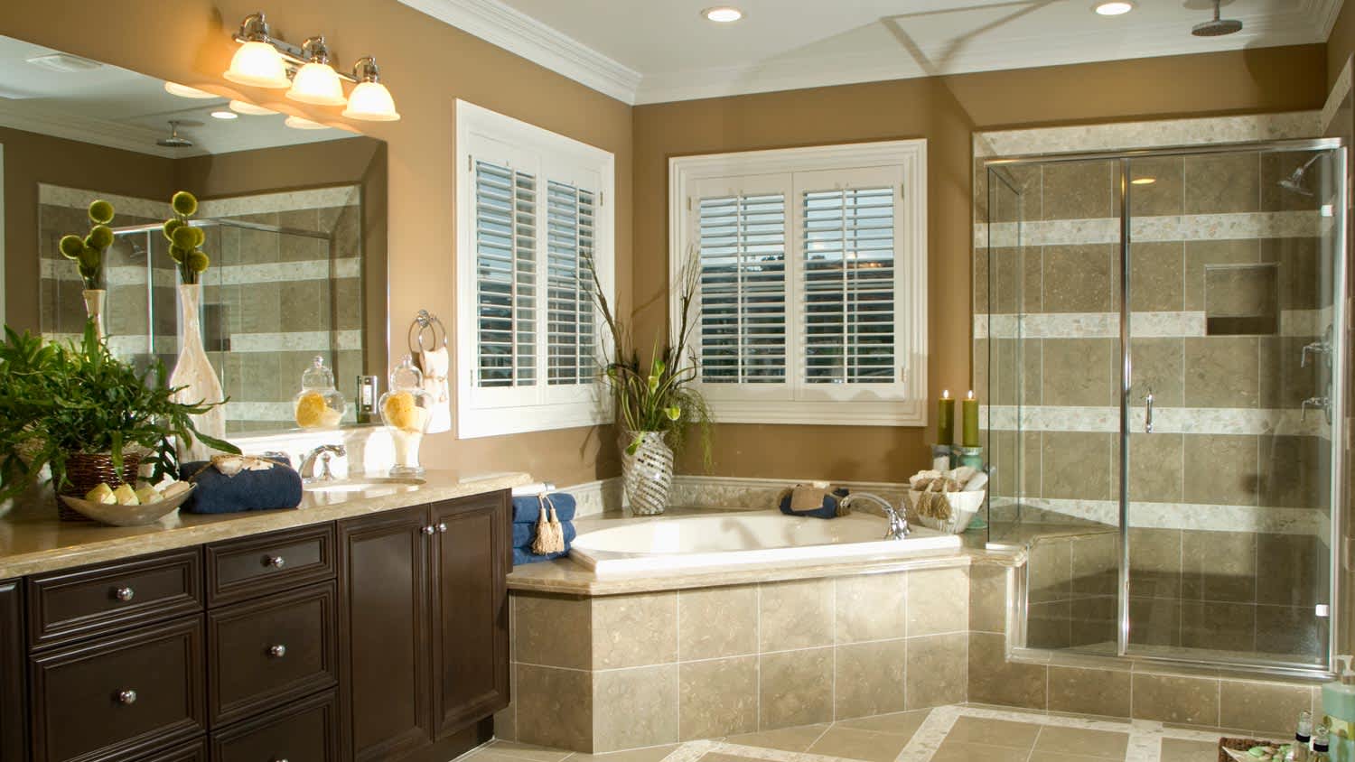 A track lighting above the mirror of the vanity