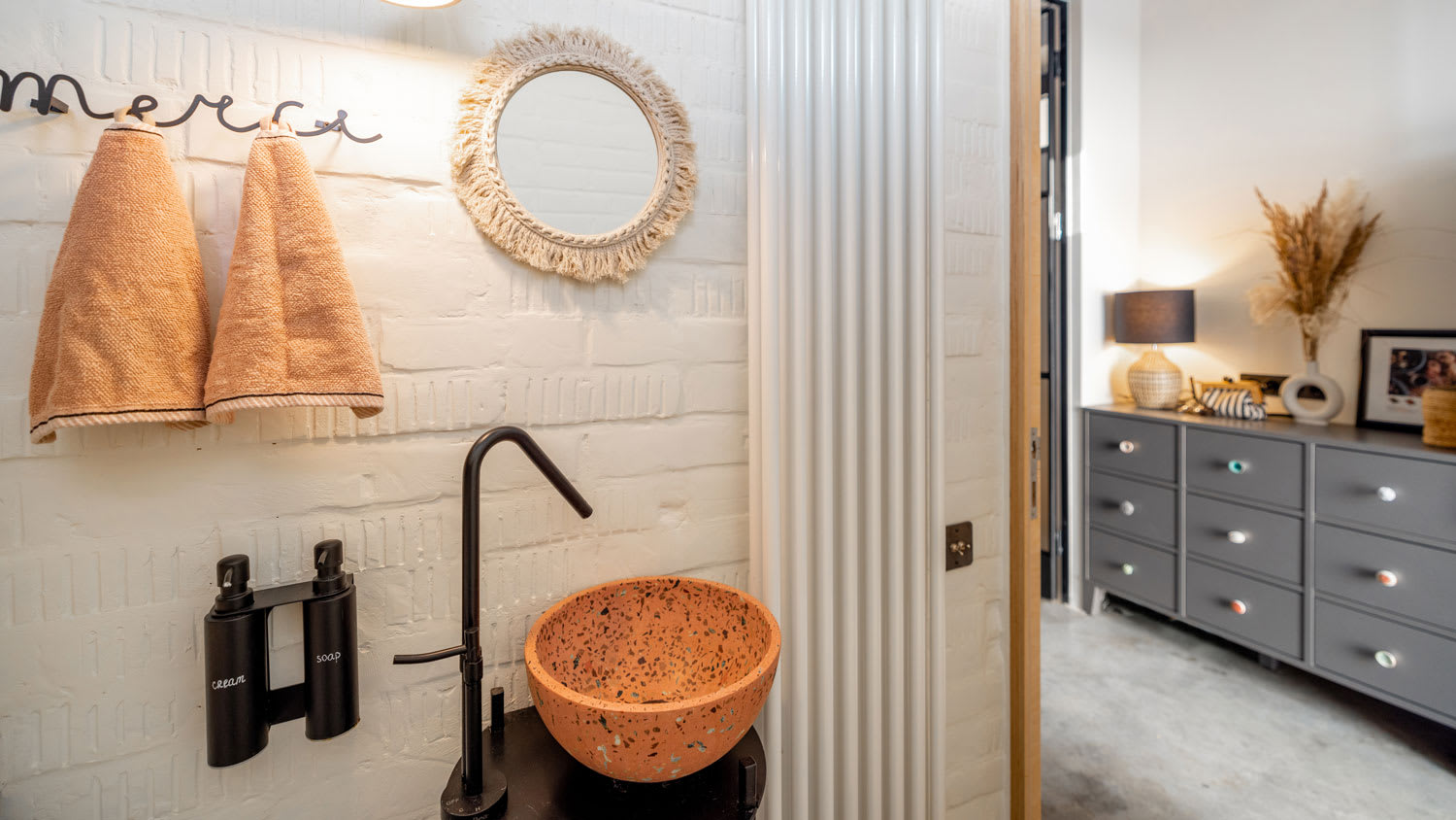 A terrazzo sink in a guest bathroom