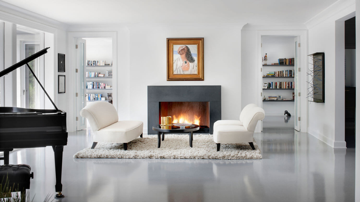 A contemporary living room with a fireplace and a piano