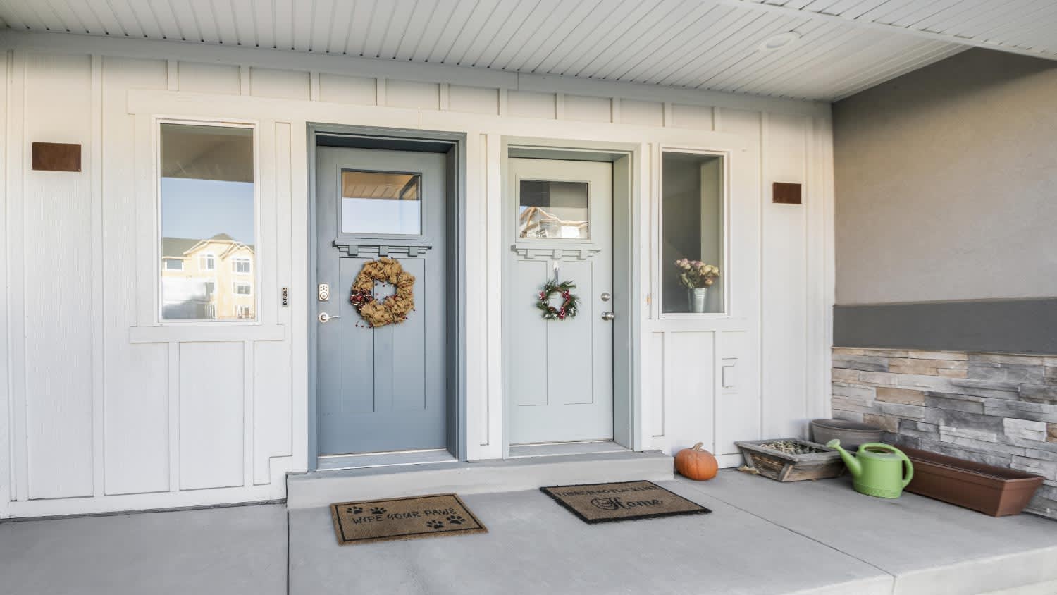 A front porch of a duplex house