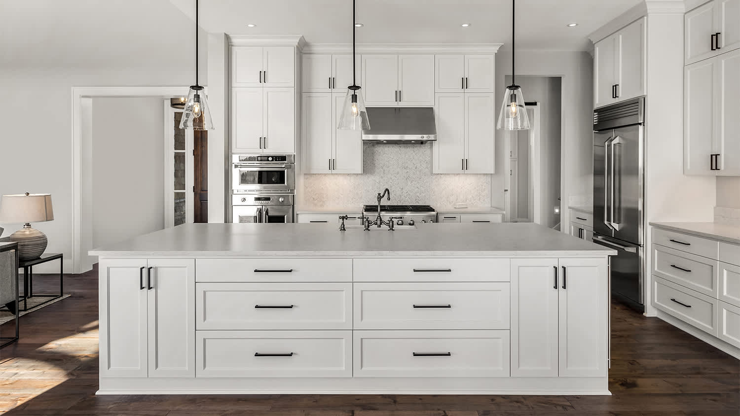 white kitchen island with drawers