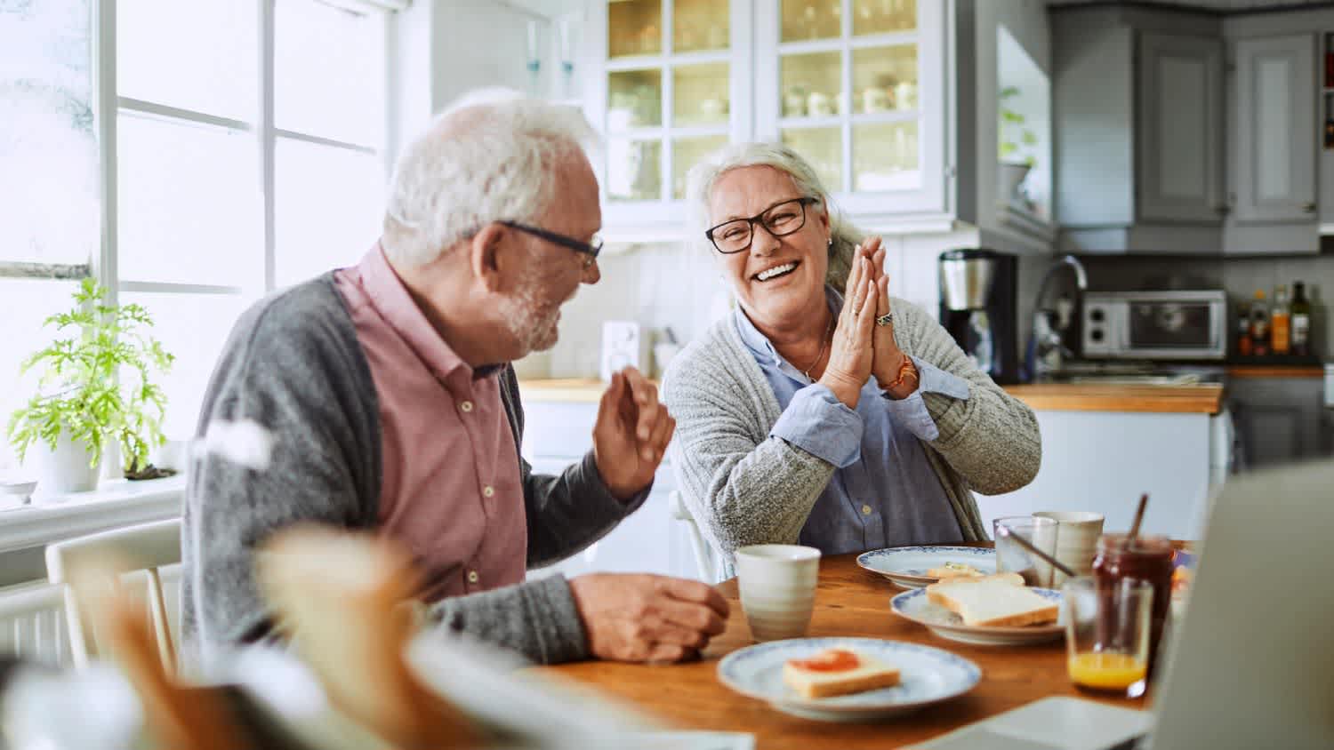 A senior couple having breakfast