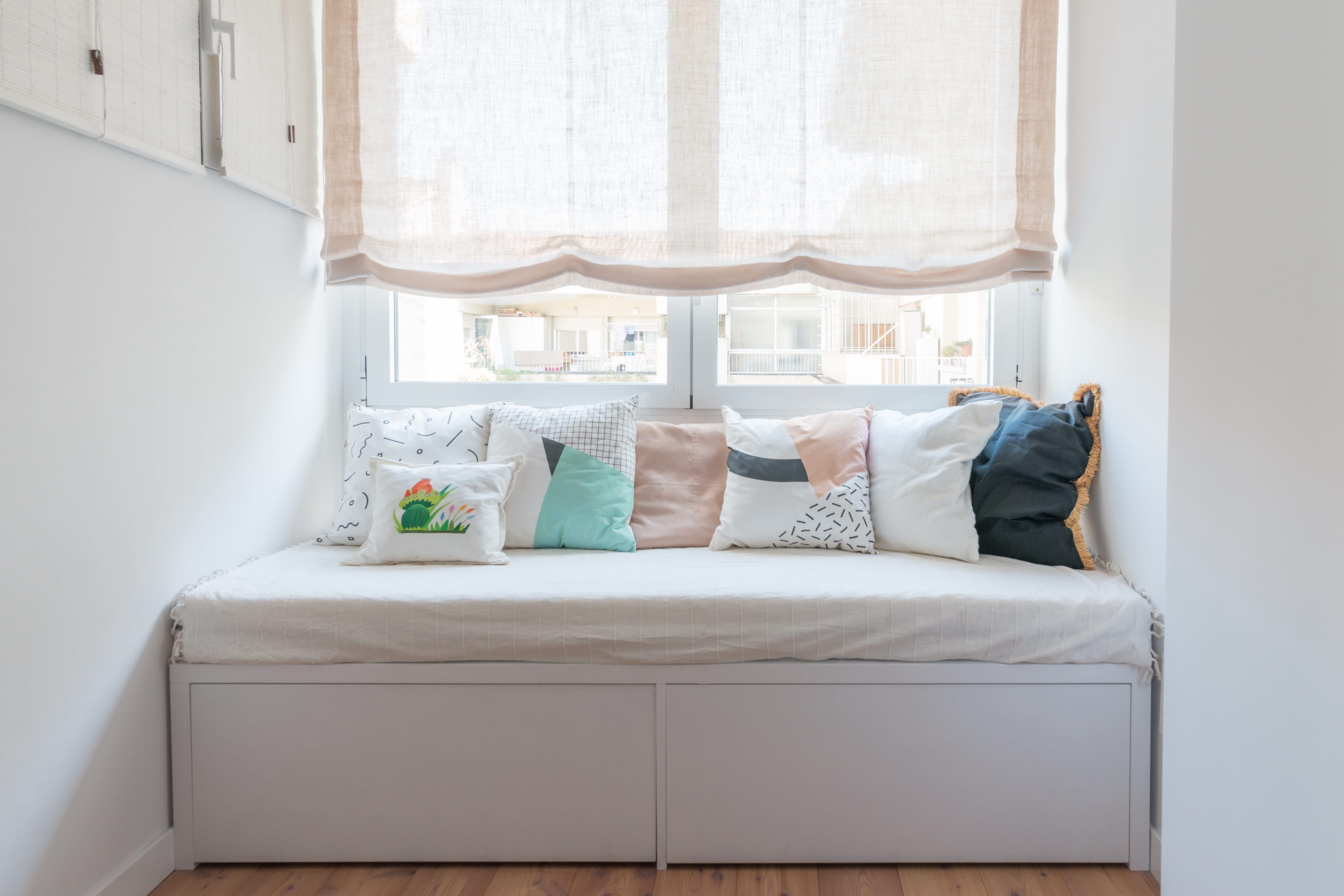 Window seat with throw pillows