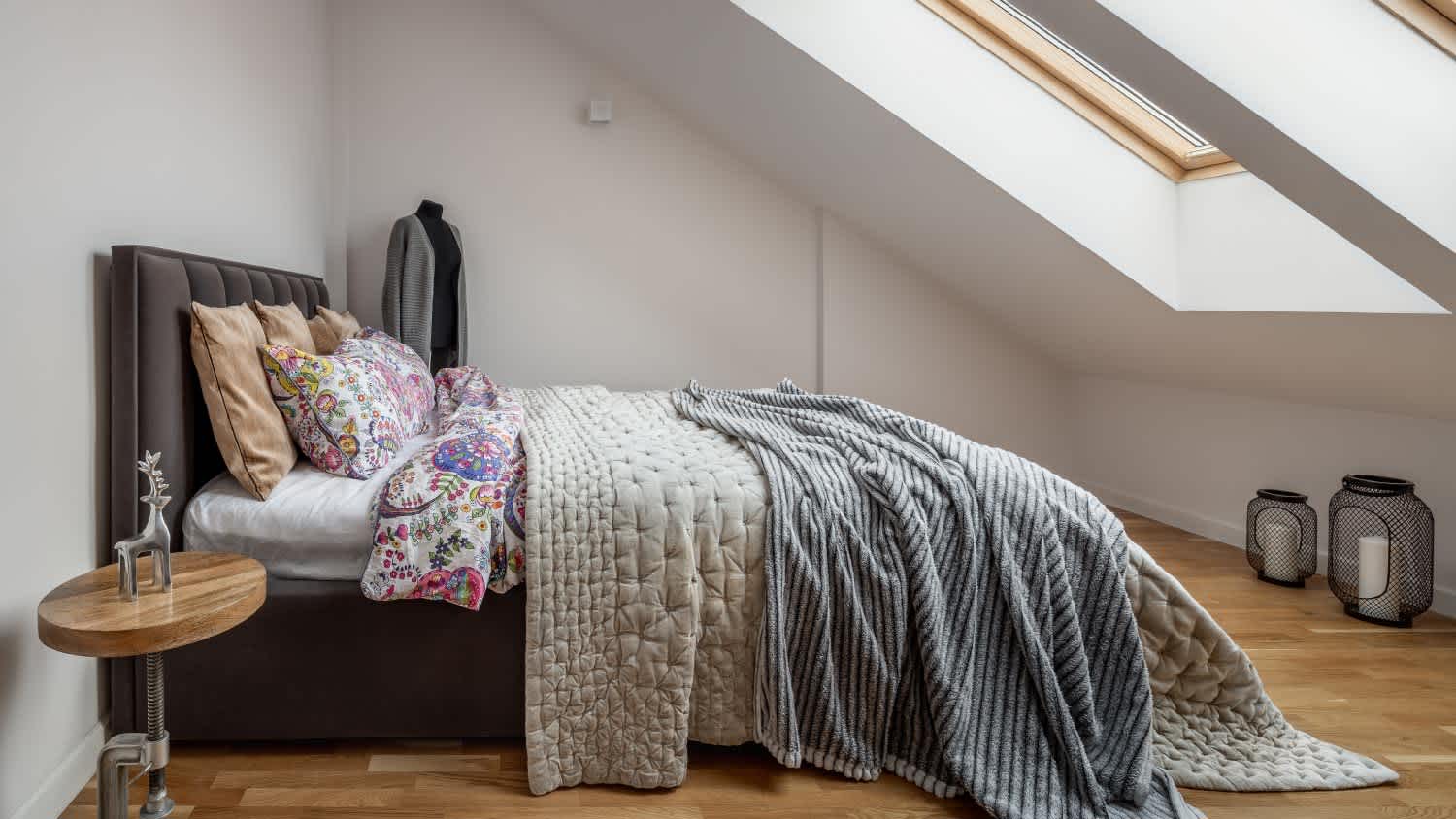 An attic bedroom with double bed