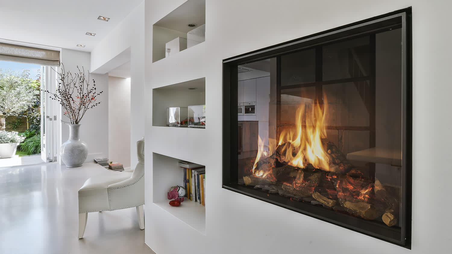 built in fireplace in white living room