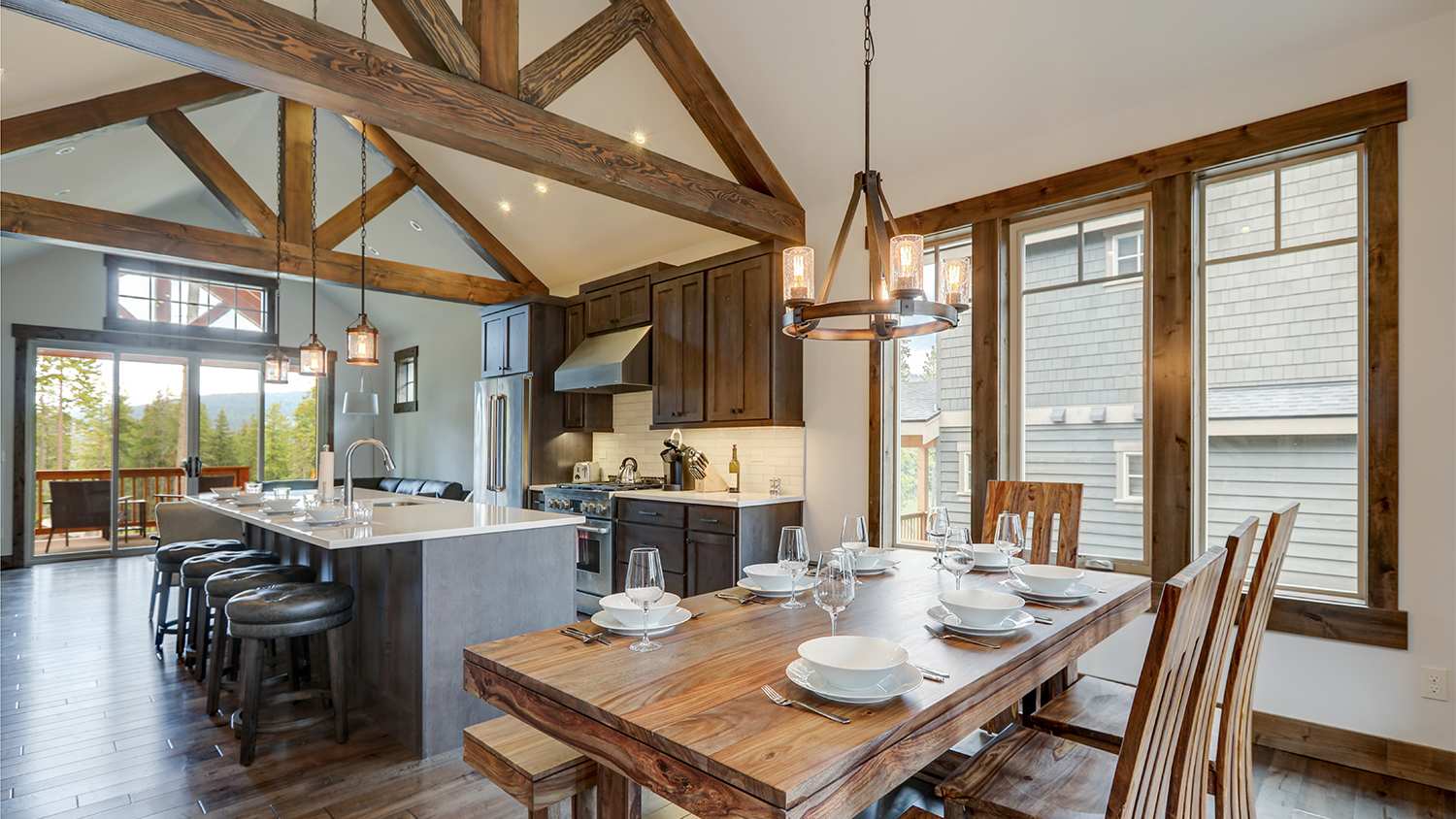kitchen dining area with exposed wood beams on ceiling