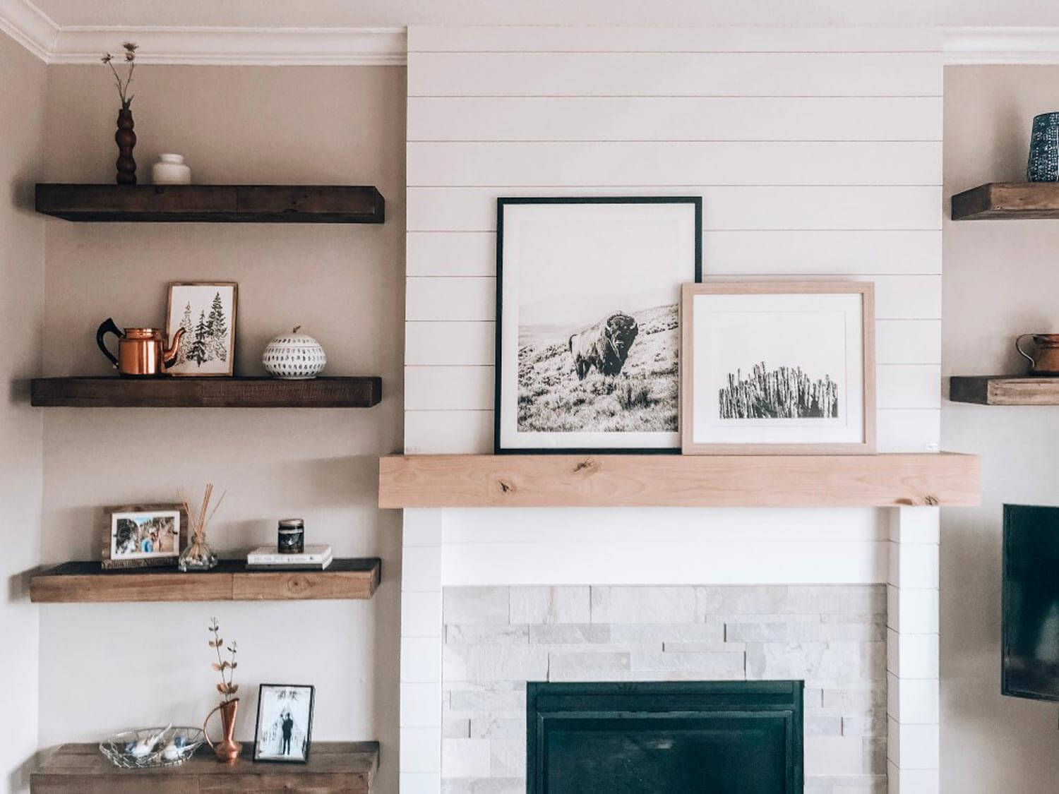 Natural toned wood shelves with warm toned decor
