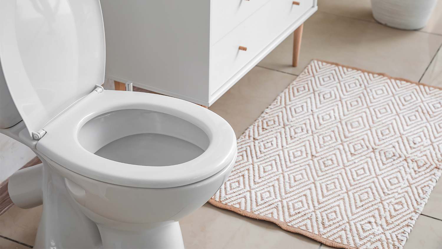 open toilet bowl in home bathroom