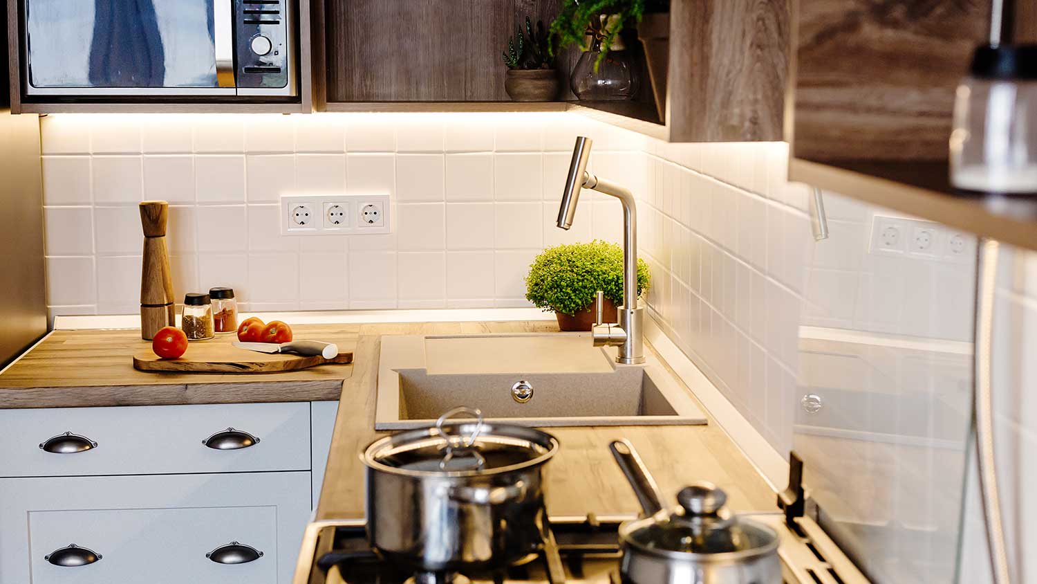 Modern kitchen with under cabinet lighting