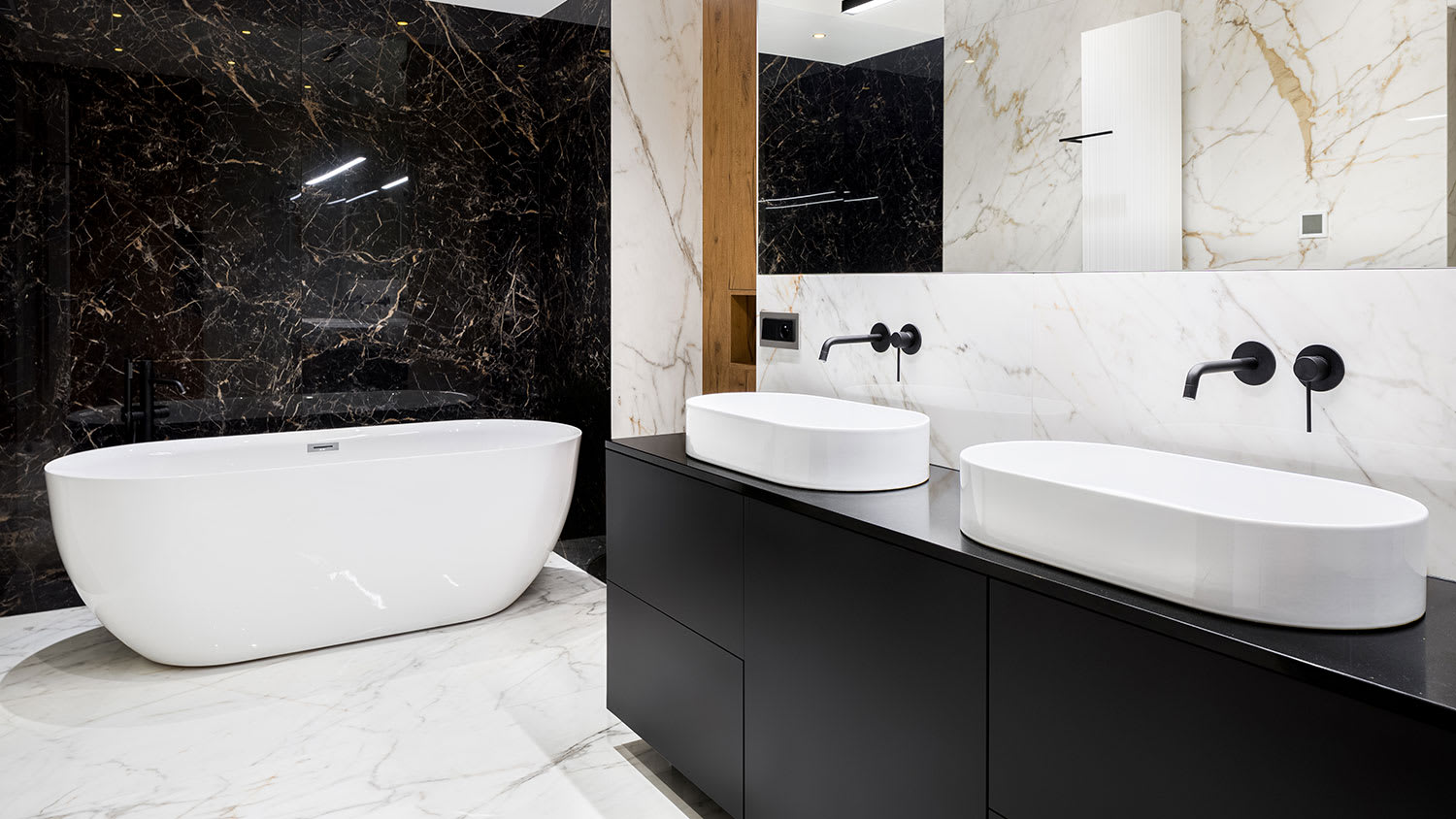 Luxury bathroom with black marble wall