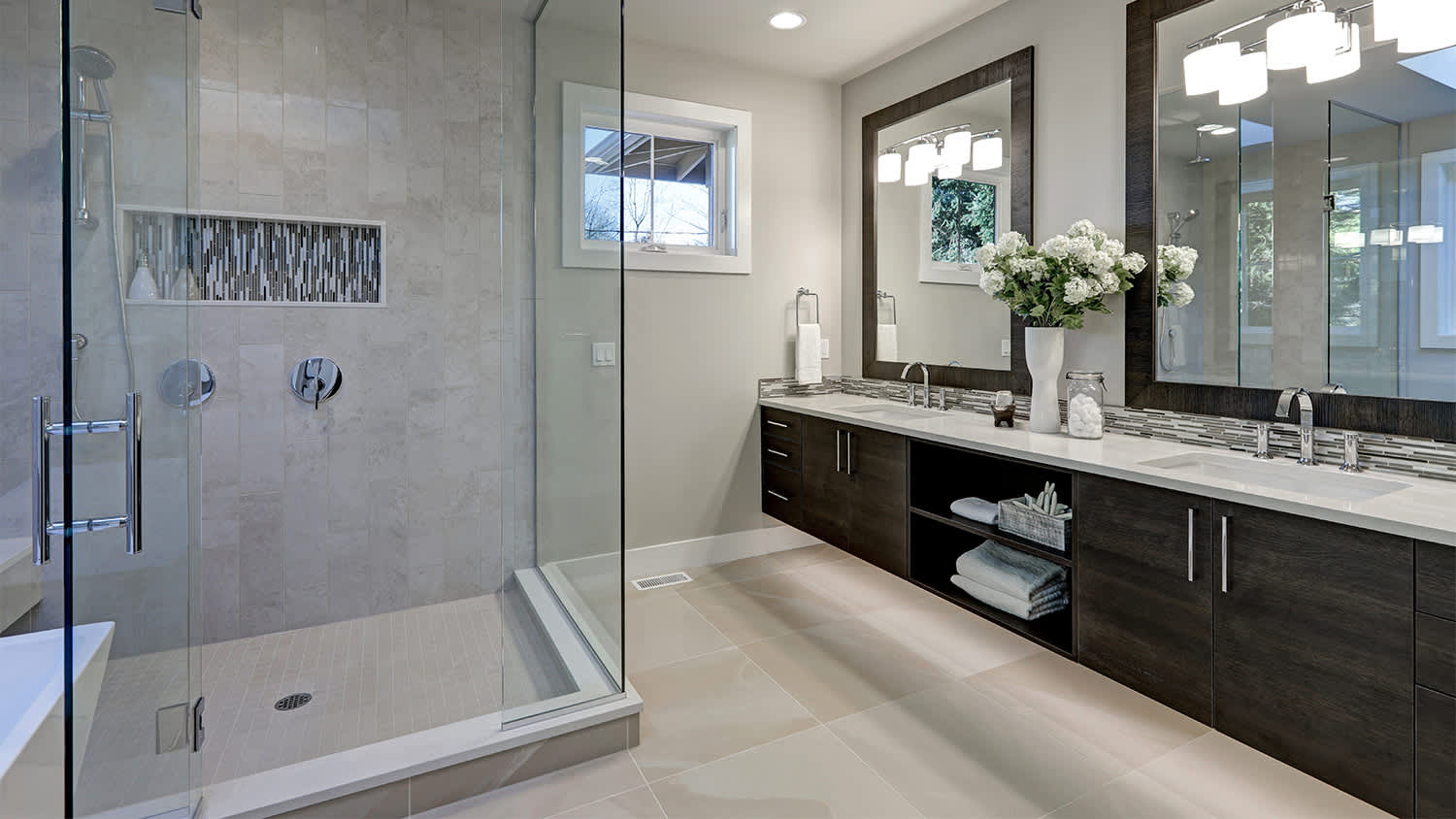 beige stone bathroom with shower storage