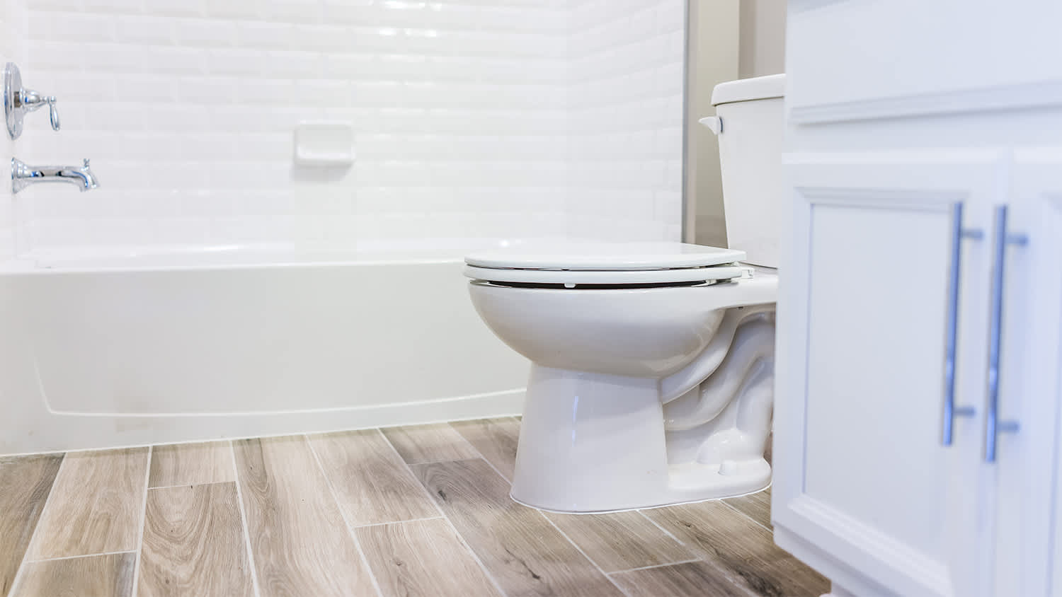 brown hardwood bathroom floor