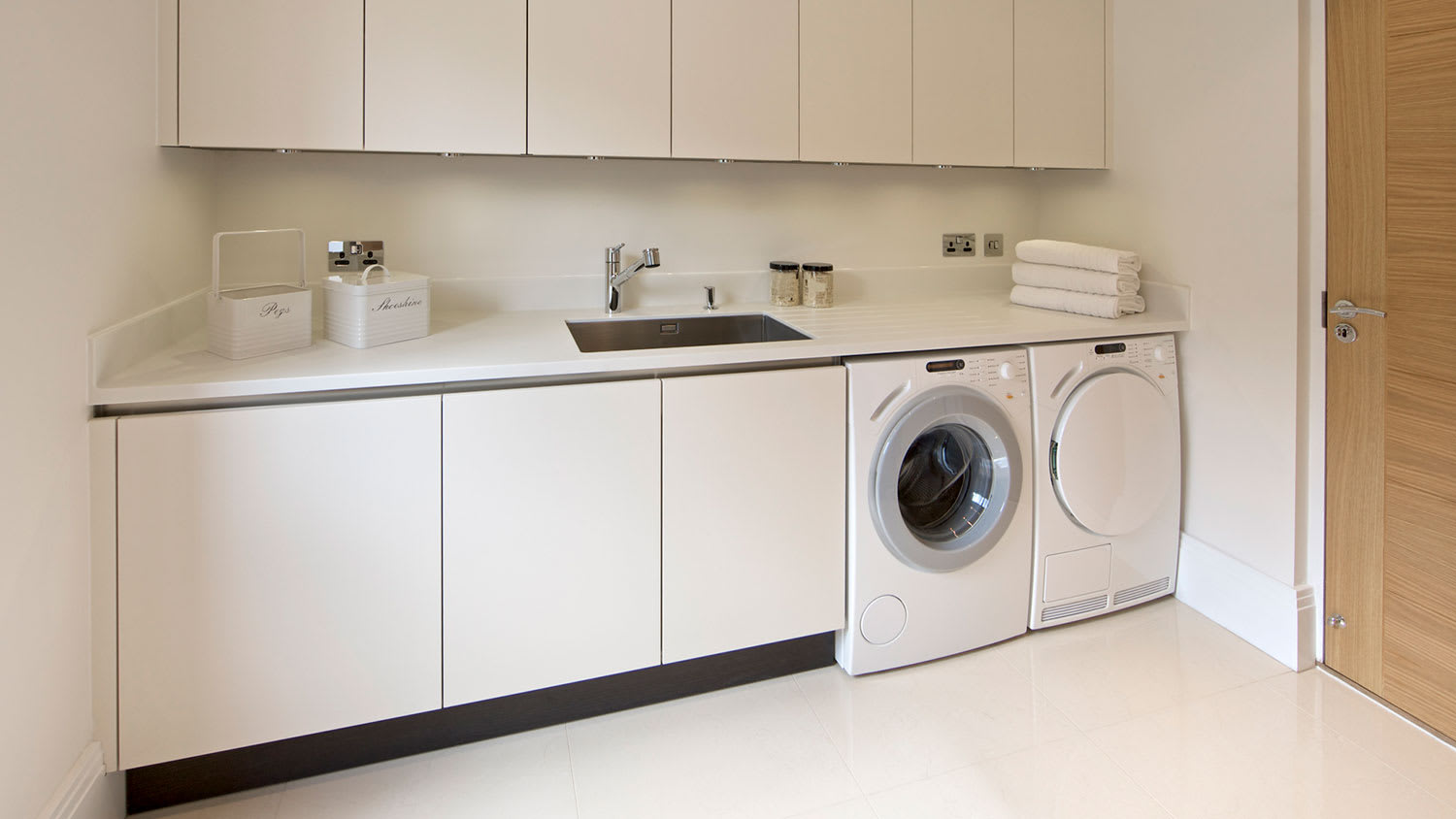Utility room with washer and dryer