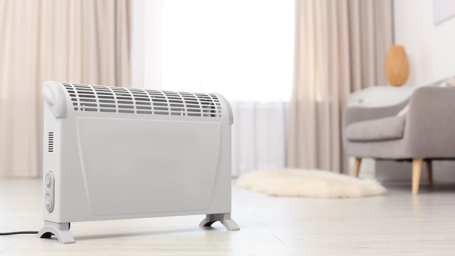 A modern electric heater on floor at home