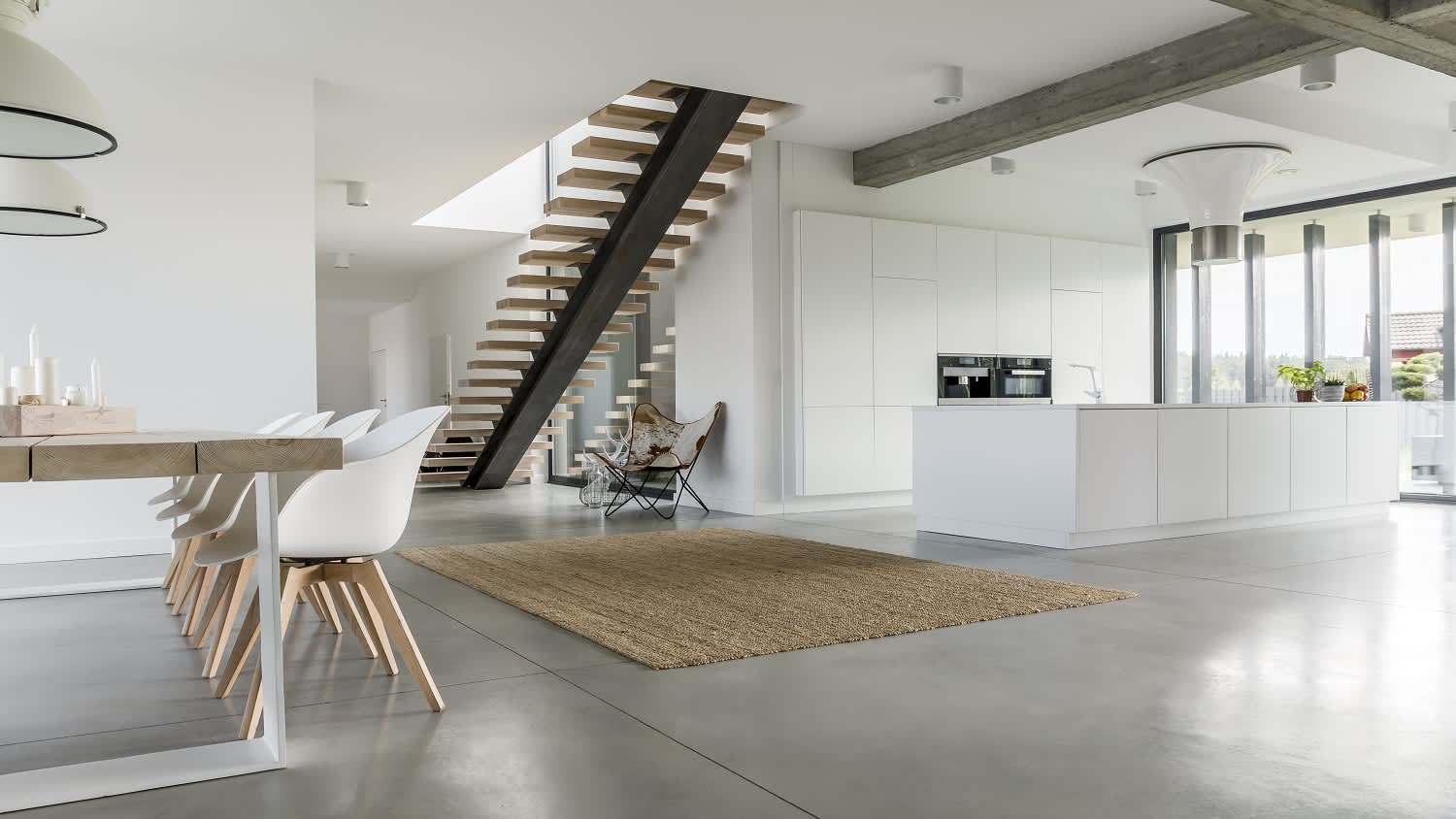 An open floor apartment with staircase