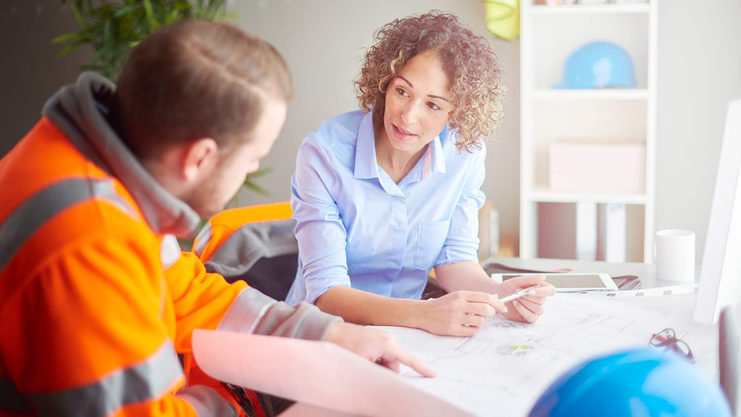 An owner talking to a candidate contractor