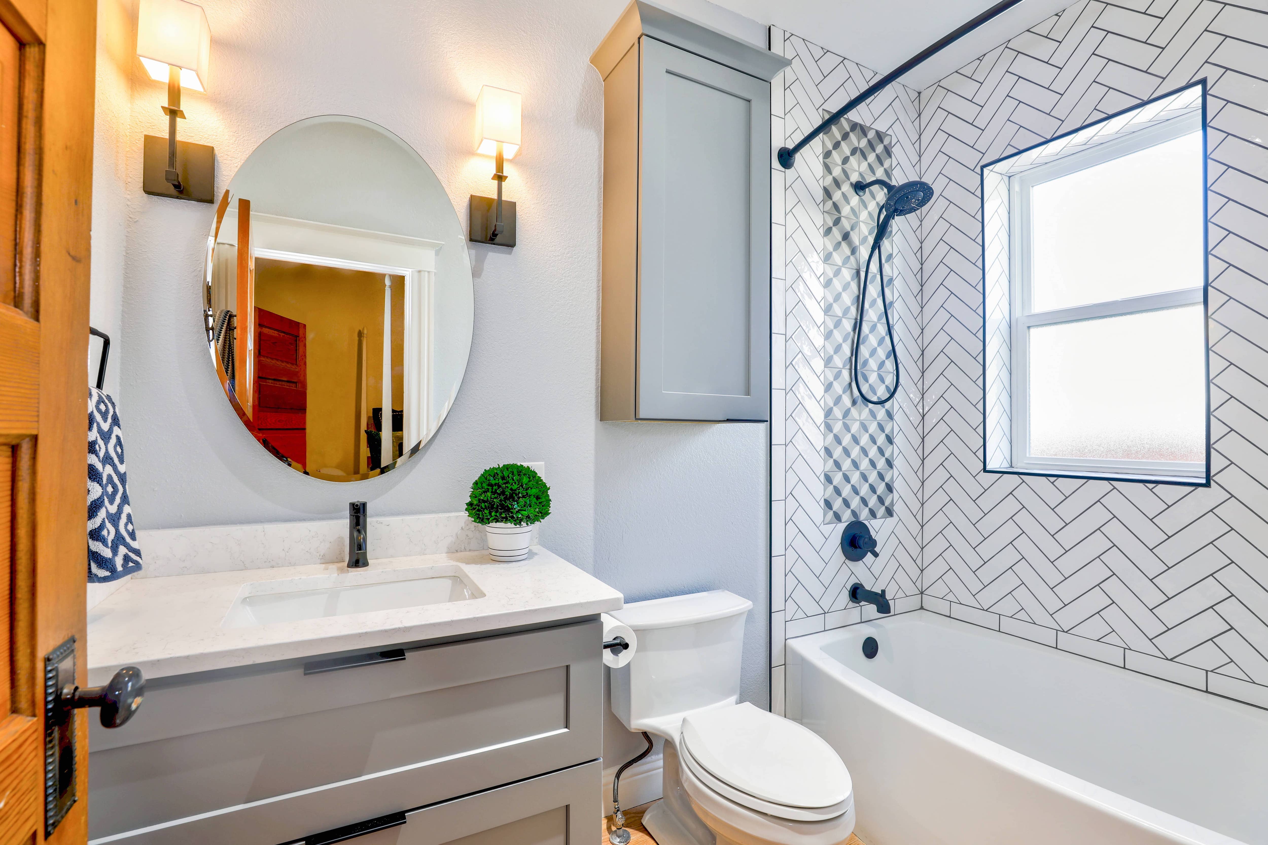 White herringbone subway tiles in shower