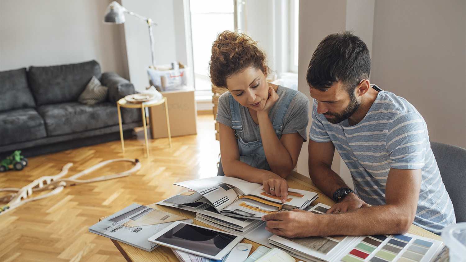 couple looking at samples for home renovation