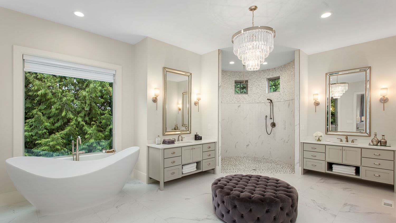 Elegant master bathroom with chandelier