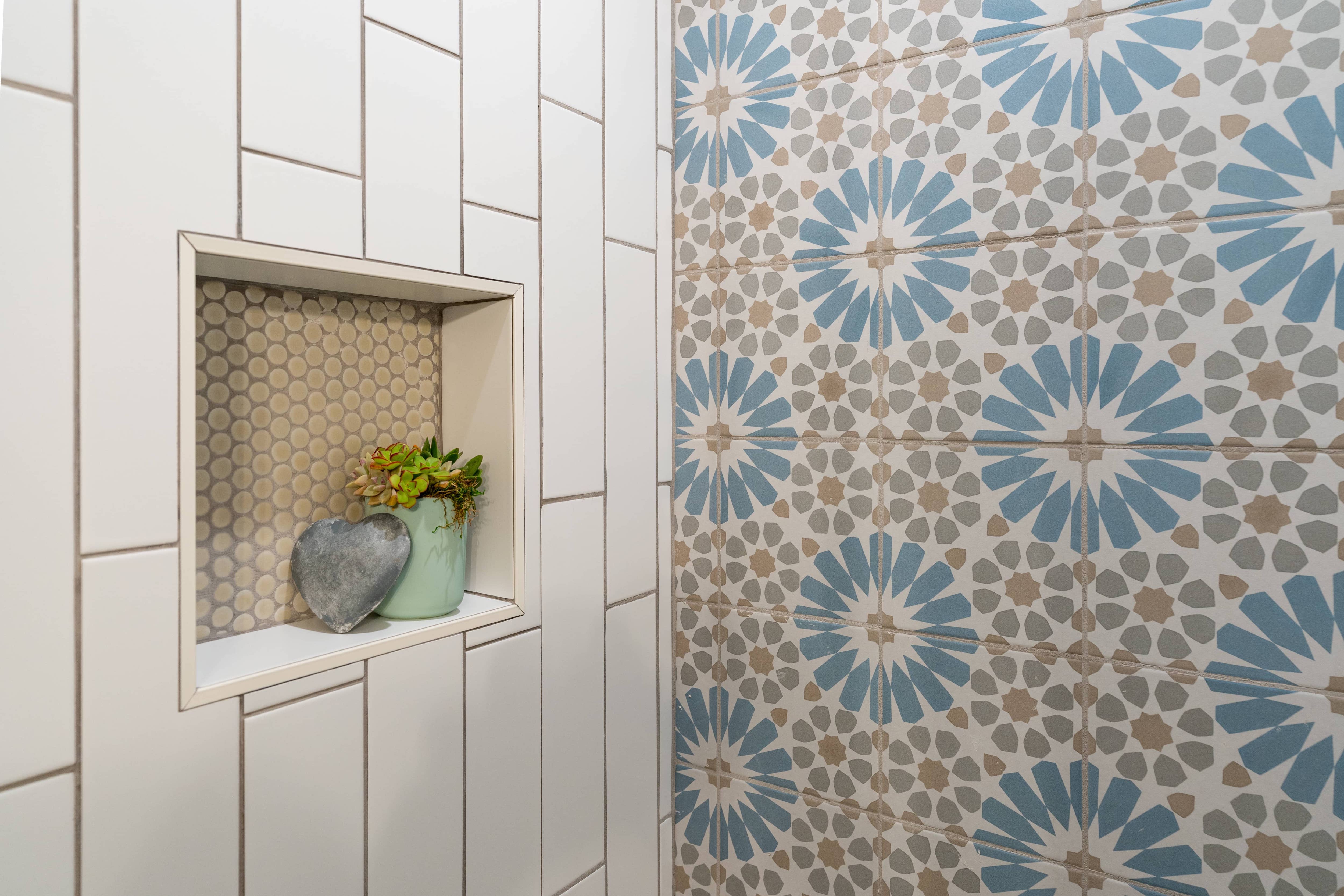 Floral patterned tile in shower