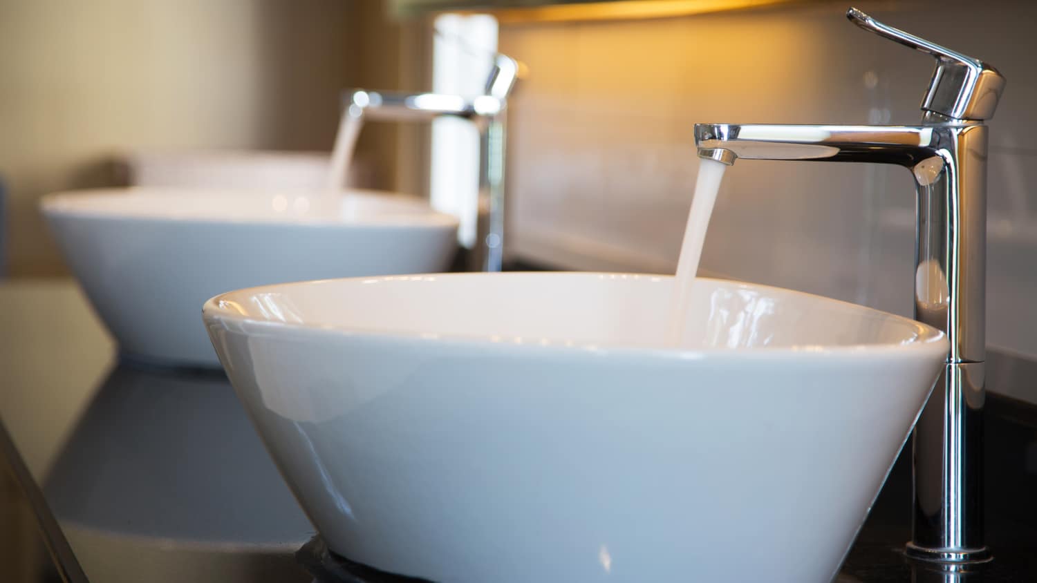 two white bathroom sinks