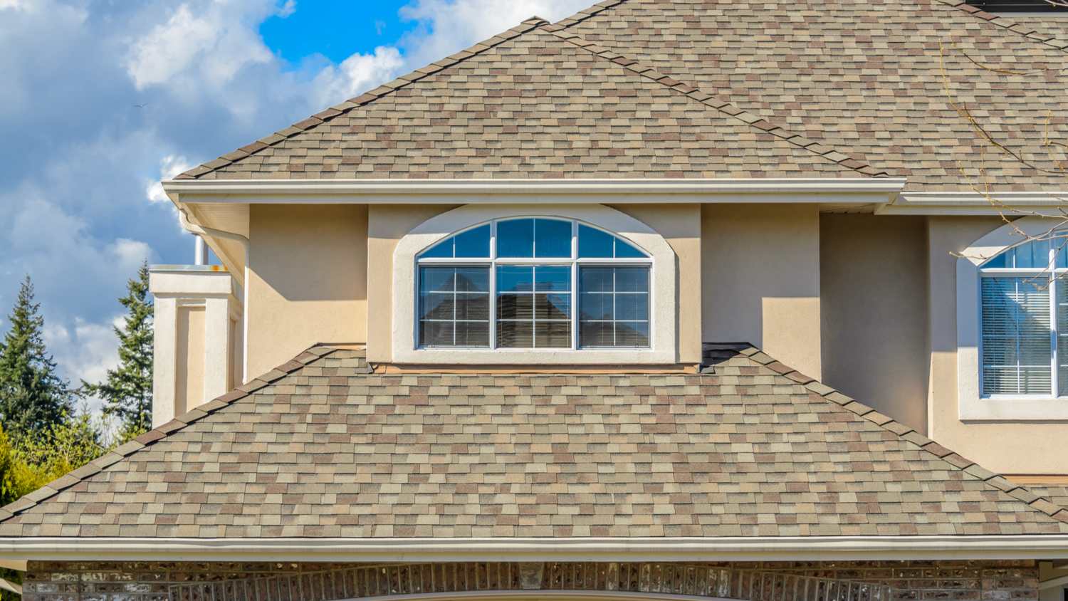 The roof of the house with large window