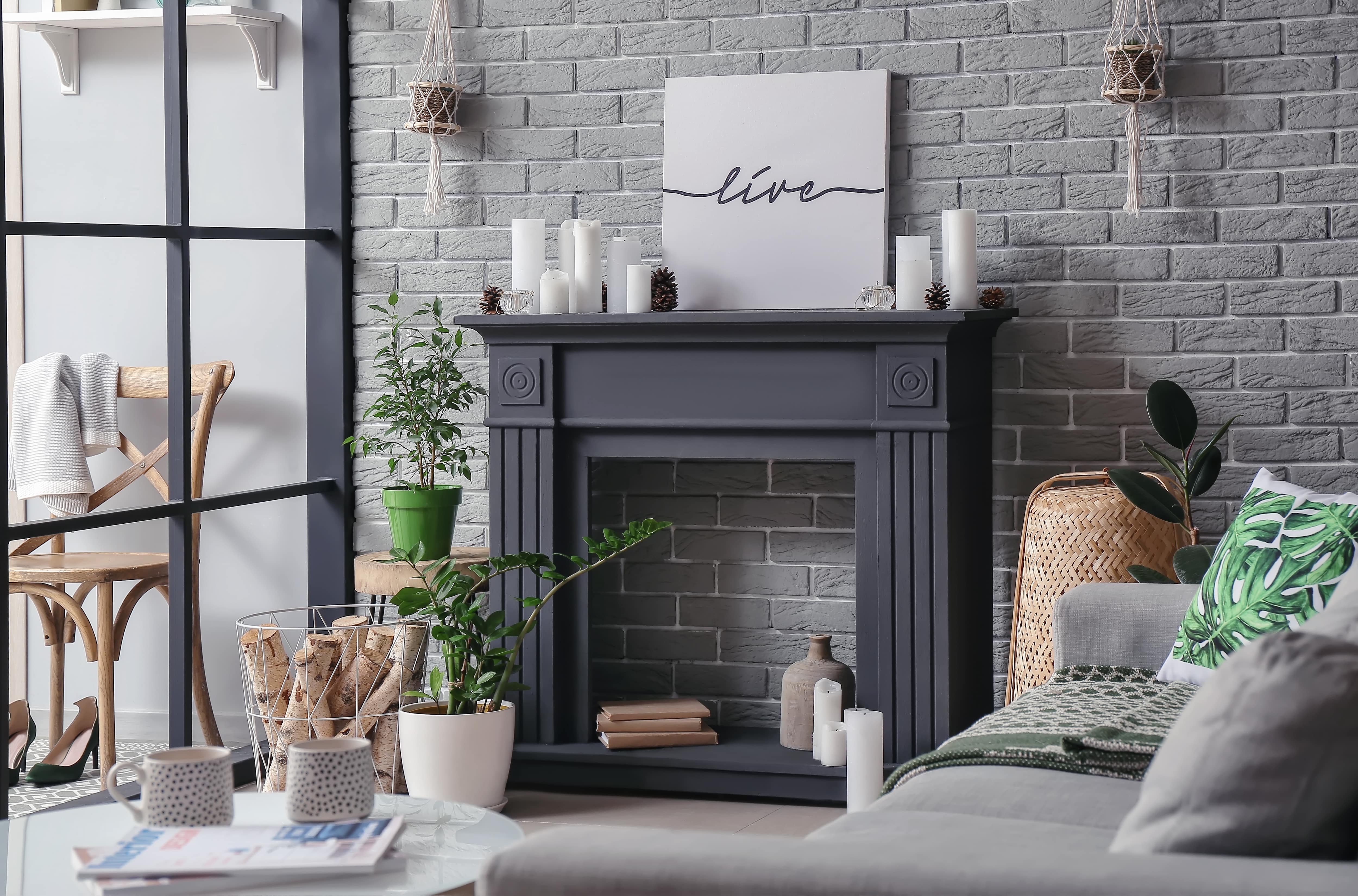 Fireplace mantel decorated with candles