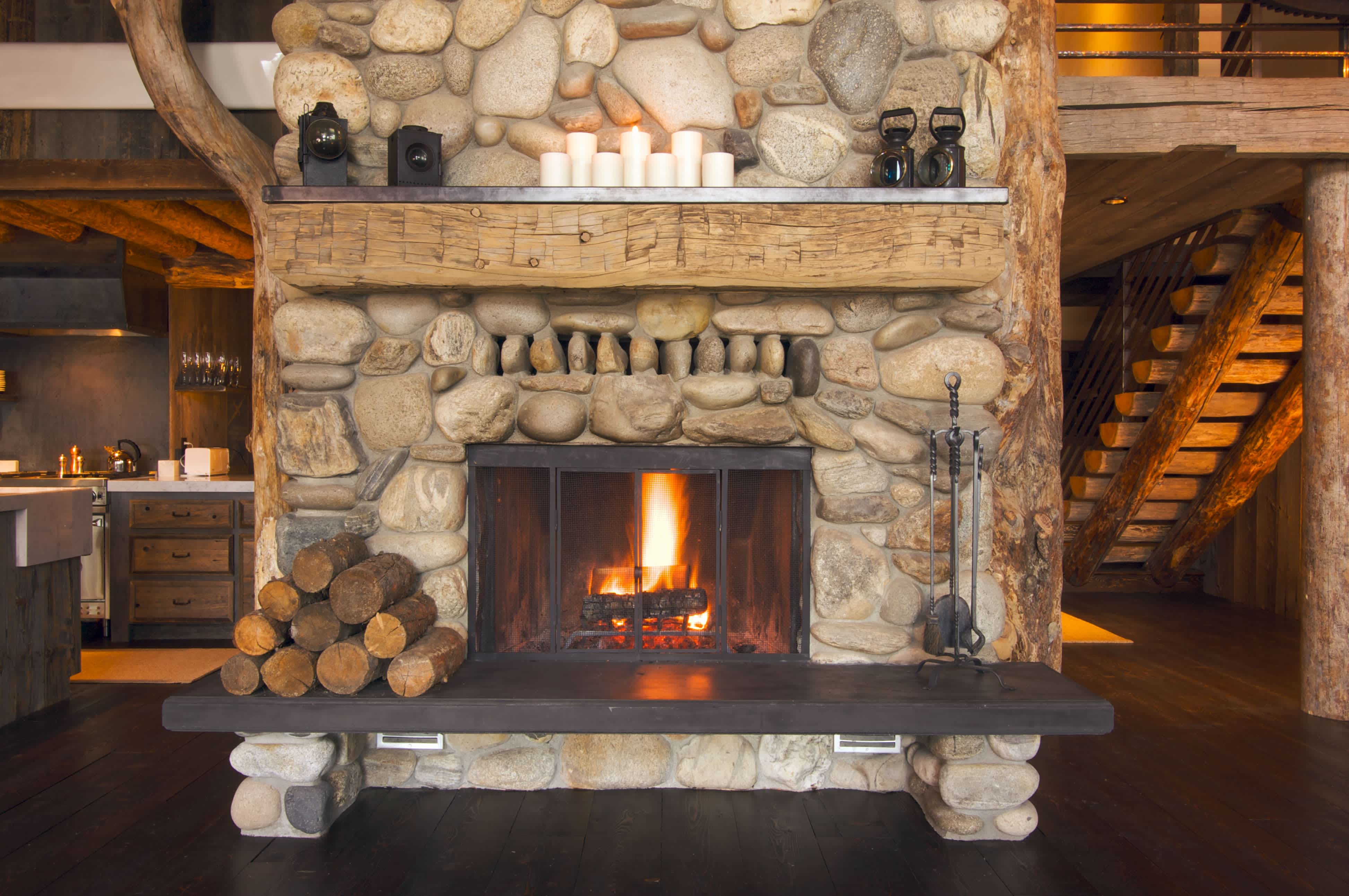 Rustic fireplace in a log cabin