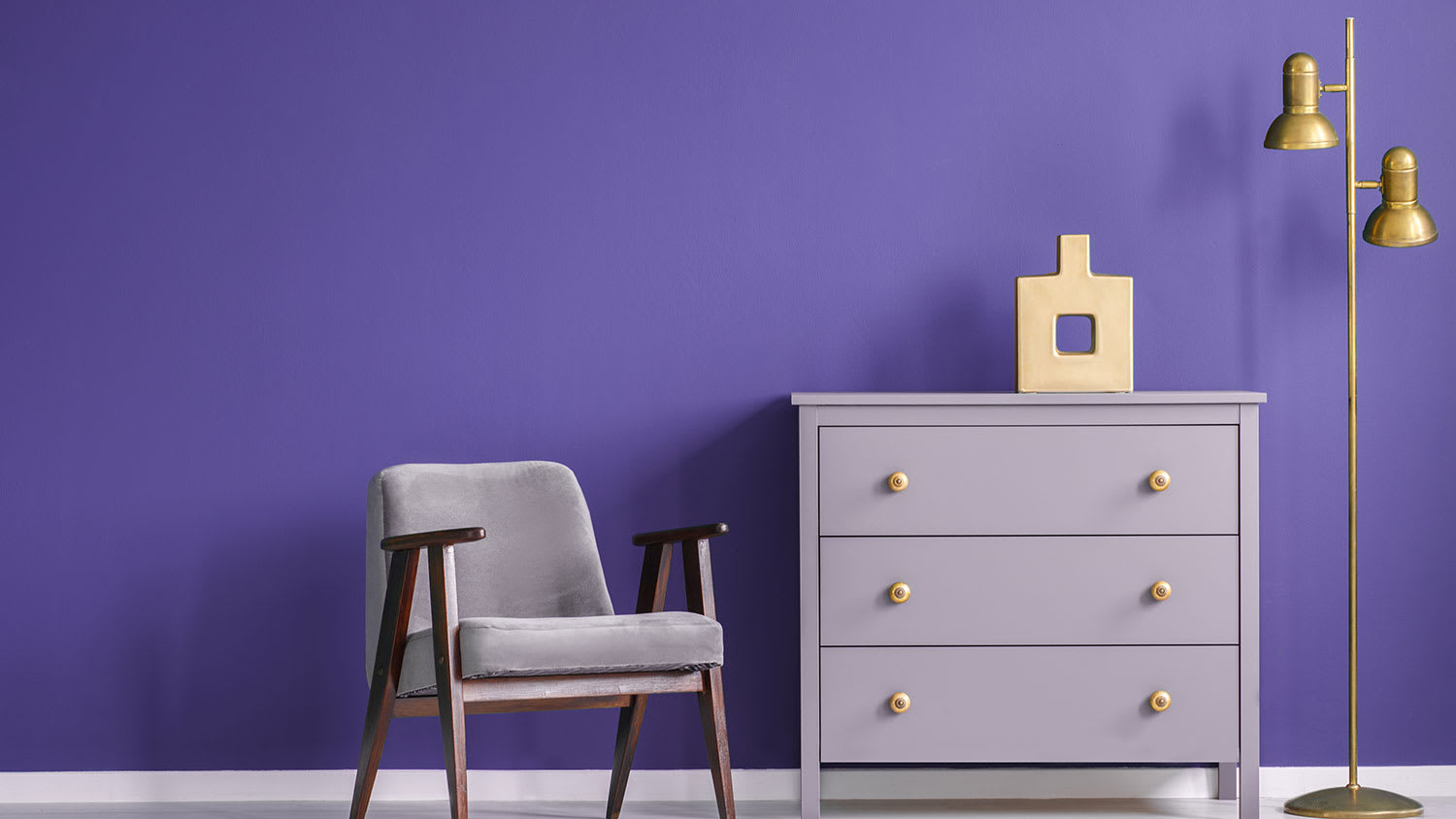 Room interior with violet wall and armchair