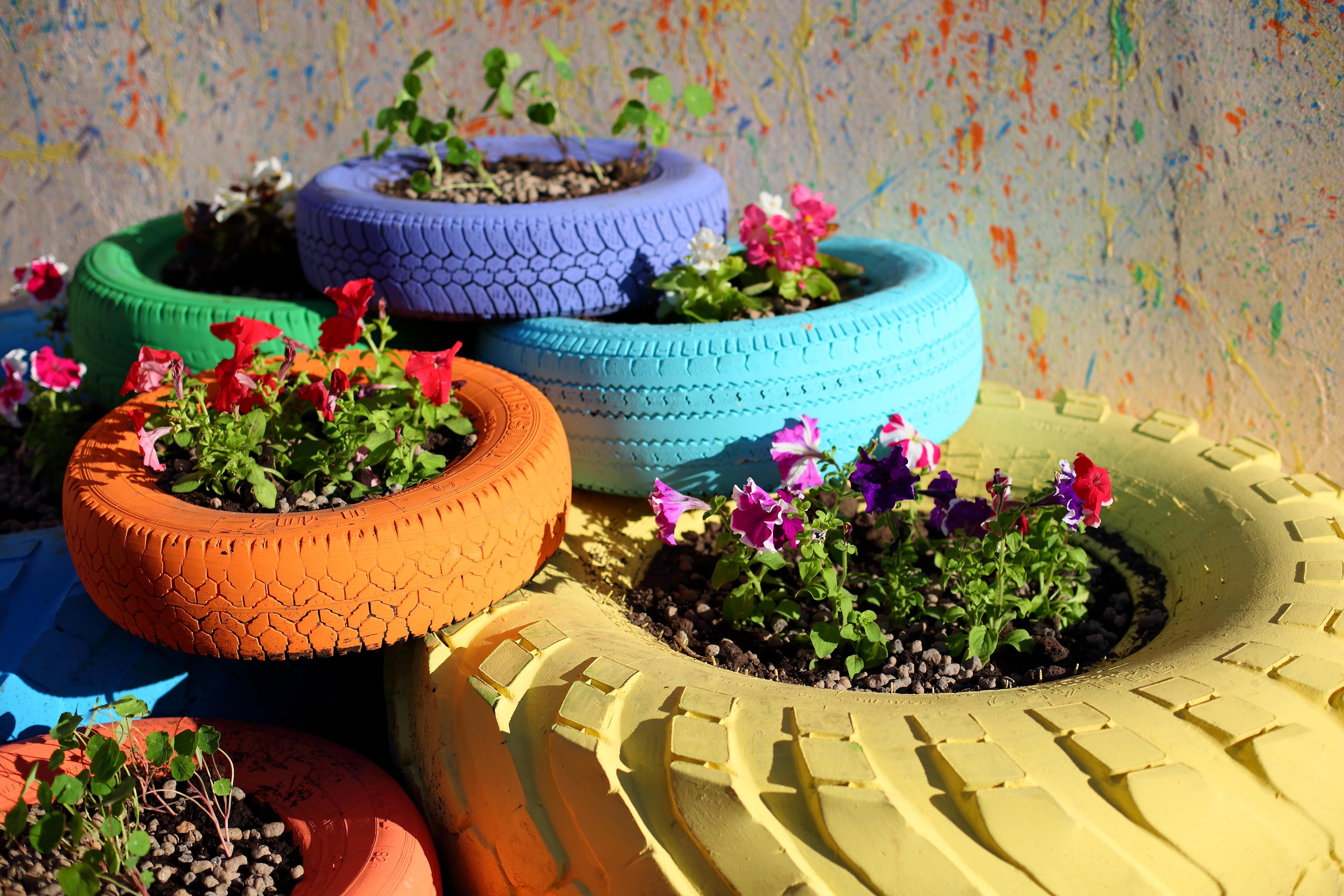 Flower beds in colorful tires