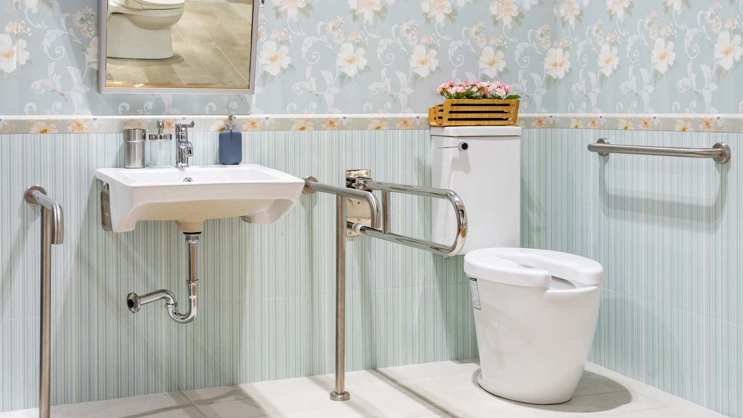 A wall mounted sink in a universal bathroom