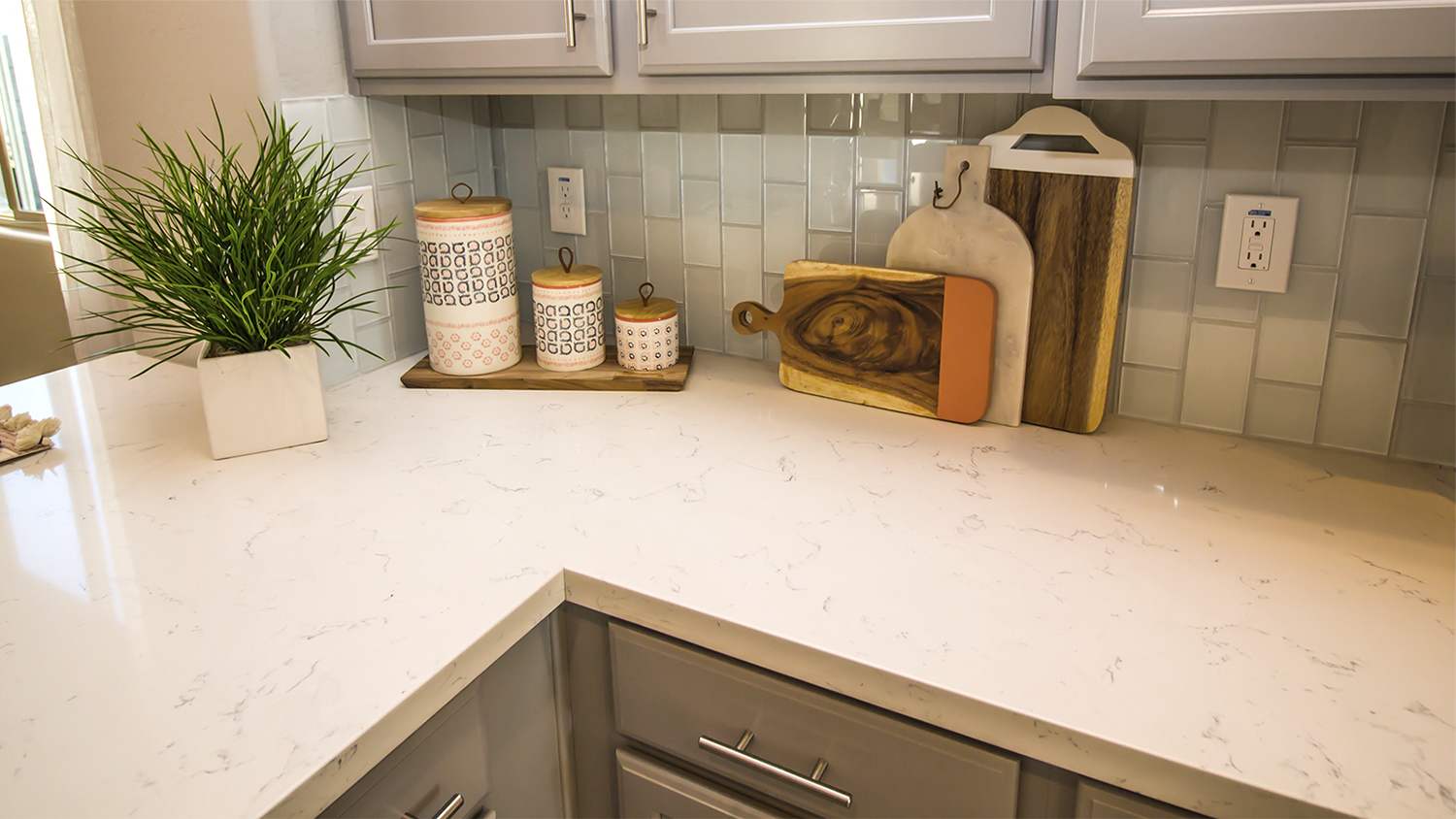 kitchen counter with outlets on backsplash