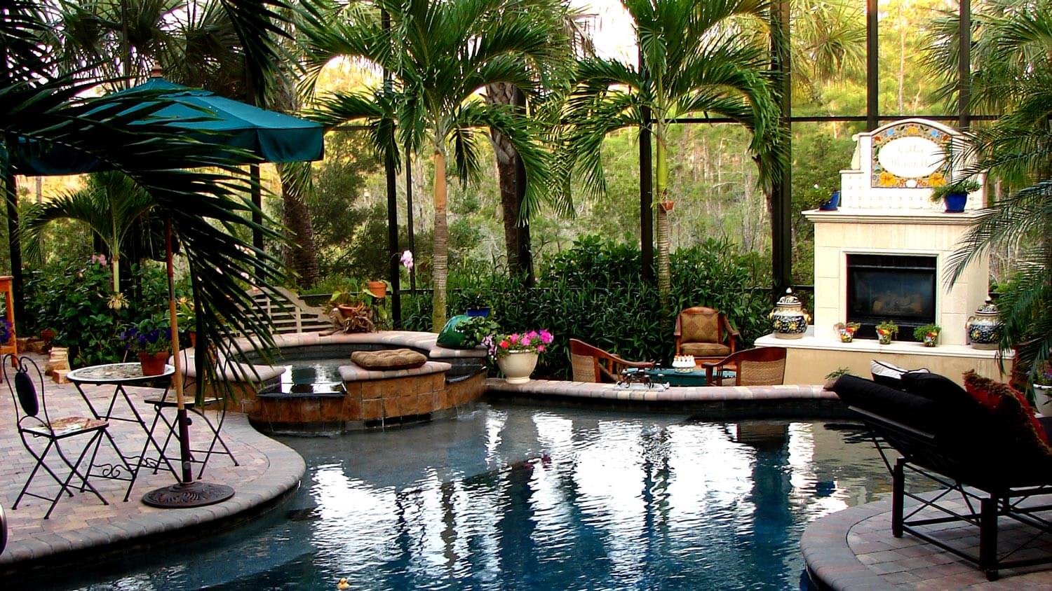 A luxurious lanai patio with an indoor pool