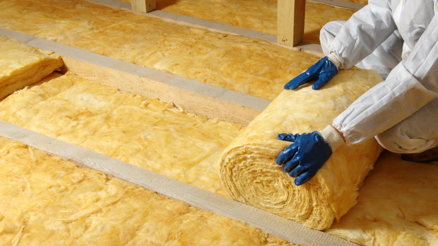 A woman in the attic working on her laptop